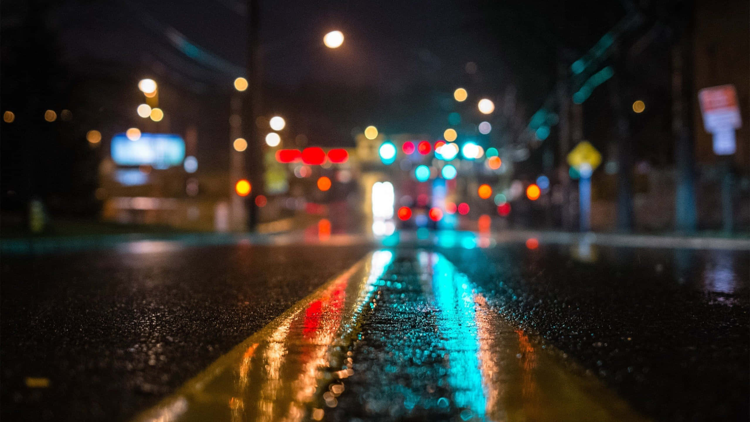 Wet Street Light, rain-slicked urban street, night, 2K Desktop Wallpaper