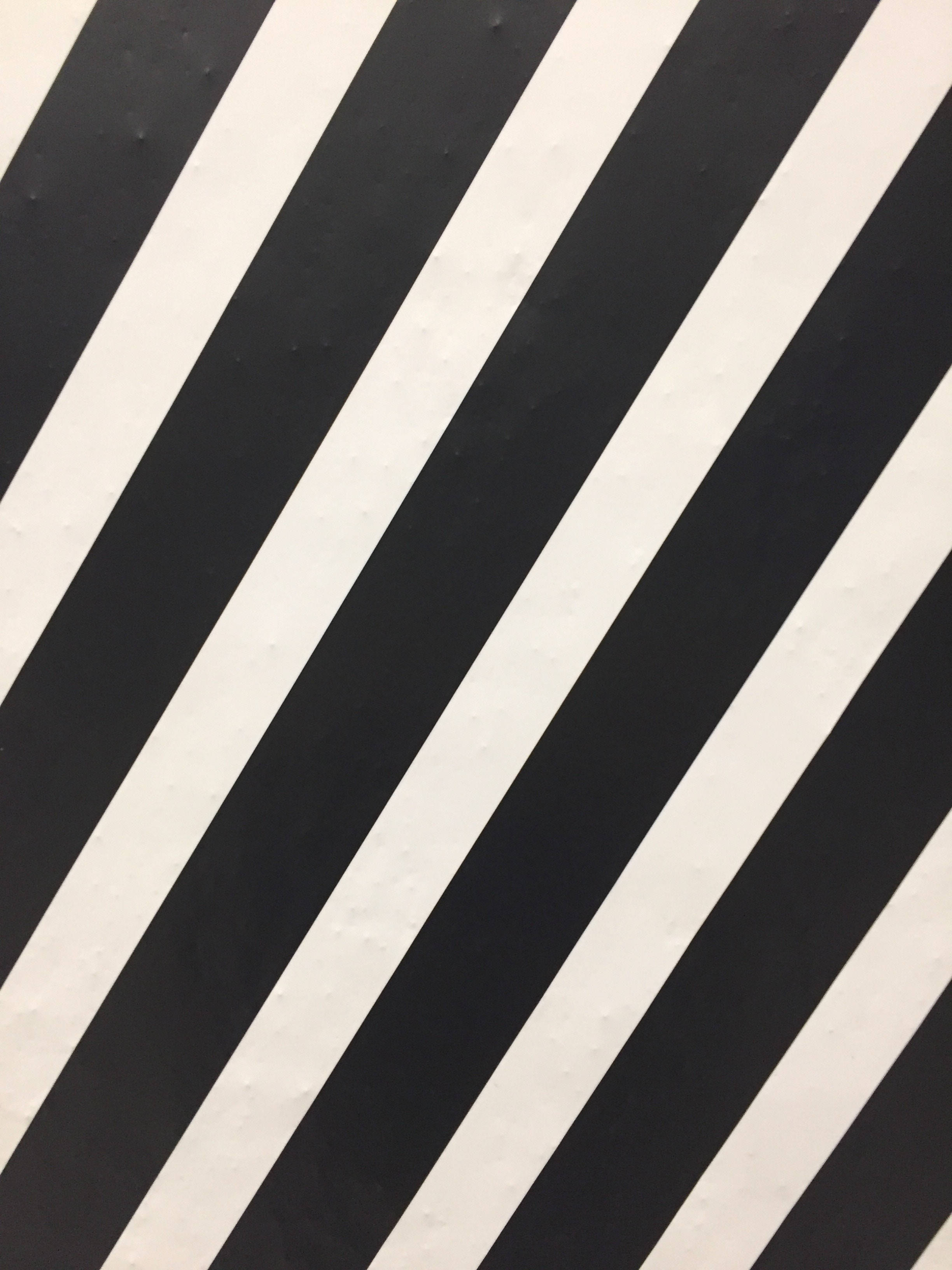 black and white zebra stripes, diagonal black and white stripes, high-contrast geometric pattern, 2K Phone Wallpaper