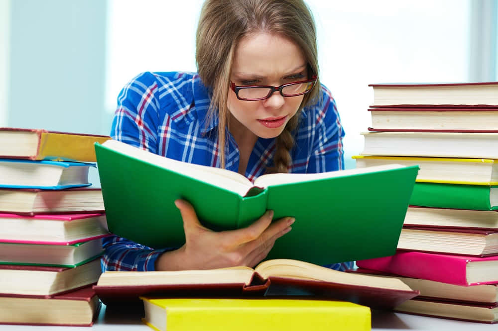 Studious Woman, green book, towering stacks of colorful textbooks, SD Desktop Wallpaper