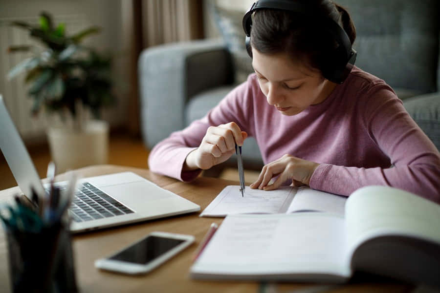 Studious, headphones, wooden desk, SD Desktop Wallpaper