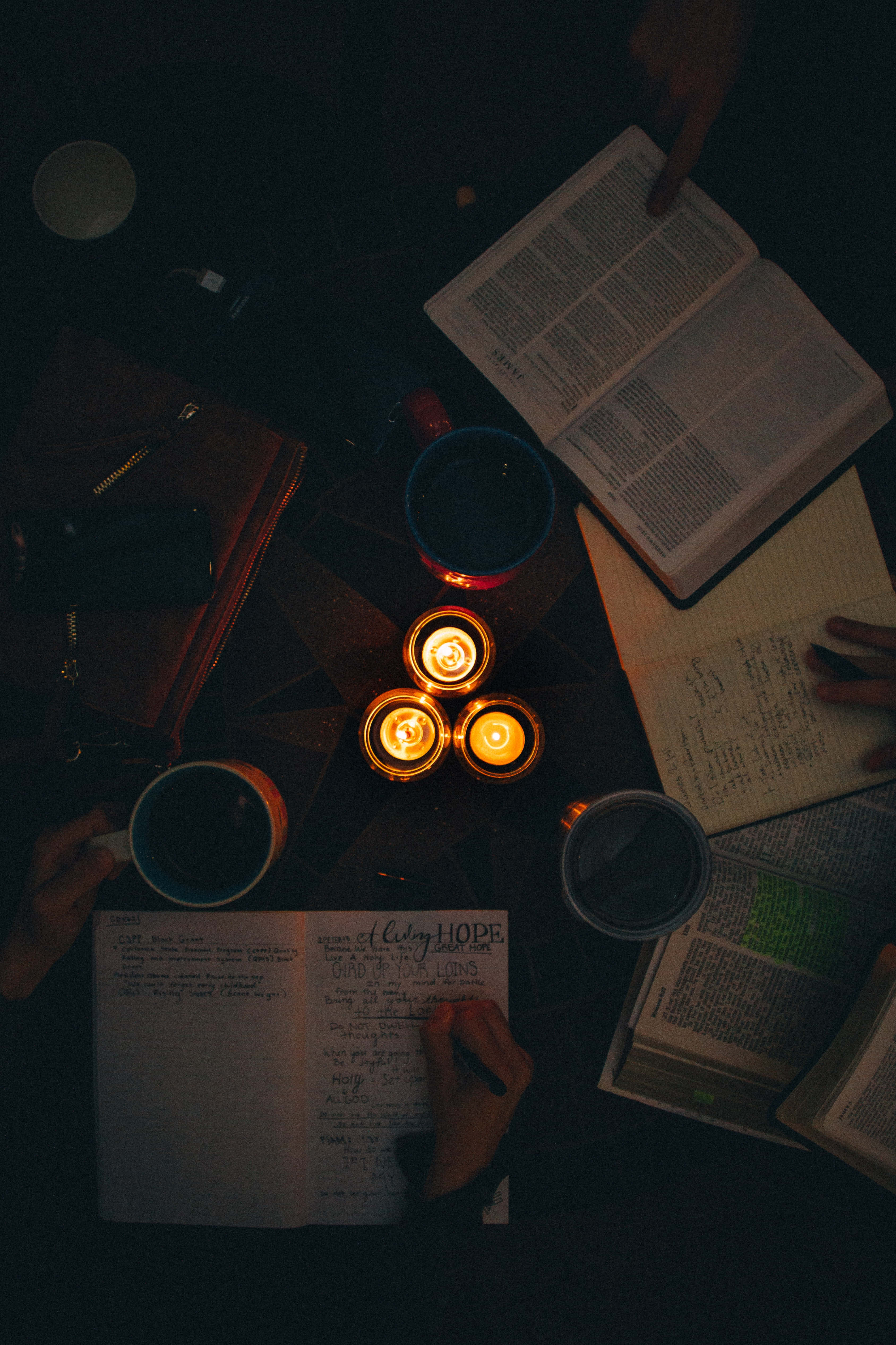 Studious, glowing candles, dimly lit room, 4K Phone Wallpaper