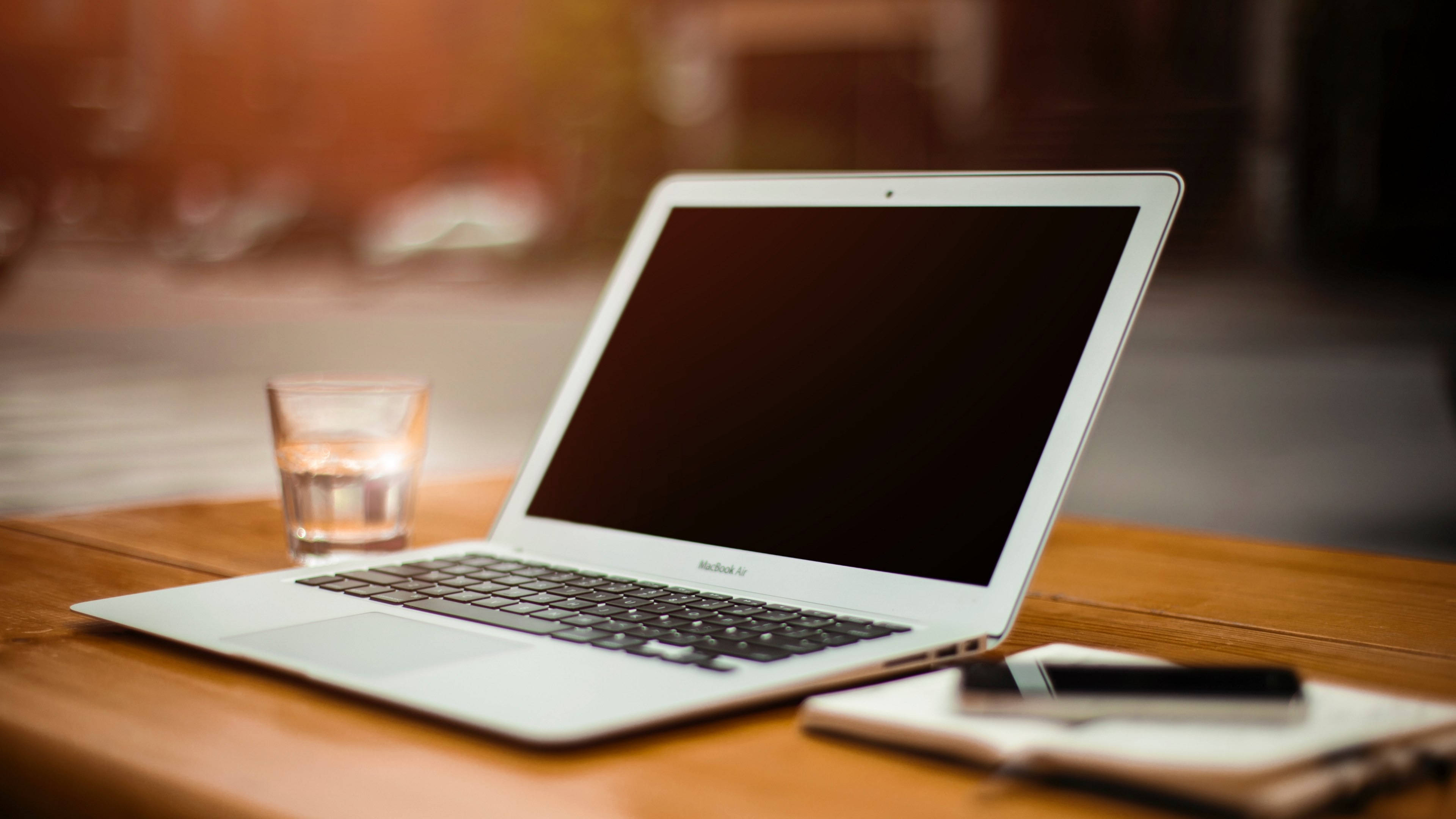 slim MacBook, silver, wooden table, 4K Desktop Wallpaper