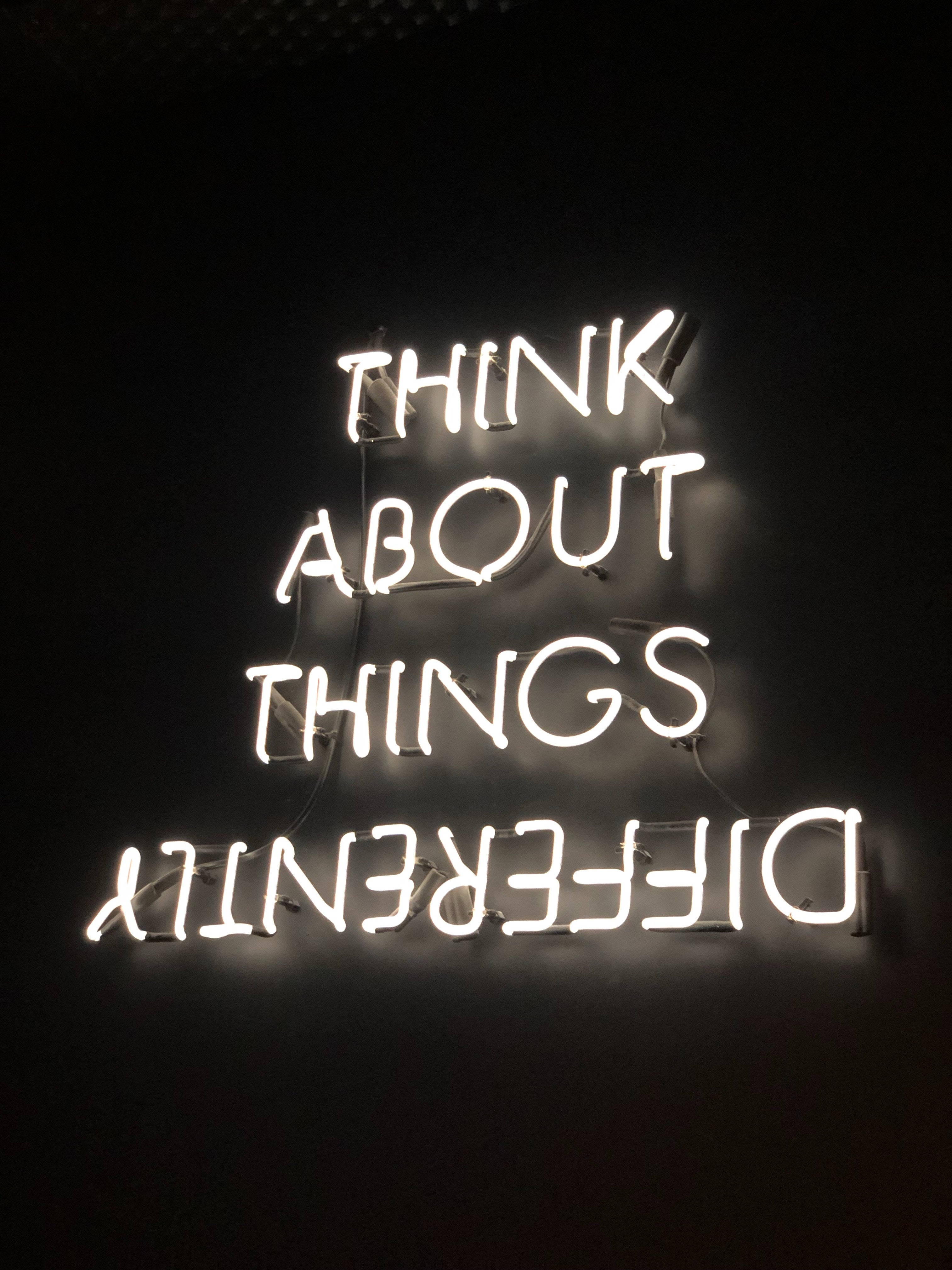 THINK ABOUT THINGS DIFFERENTLY, neon sign, glowing white, 4K Phone Wallpaper