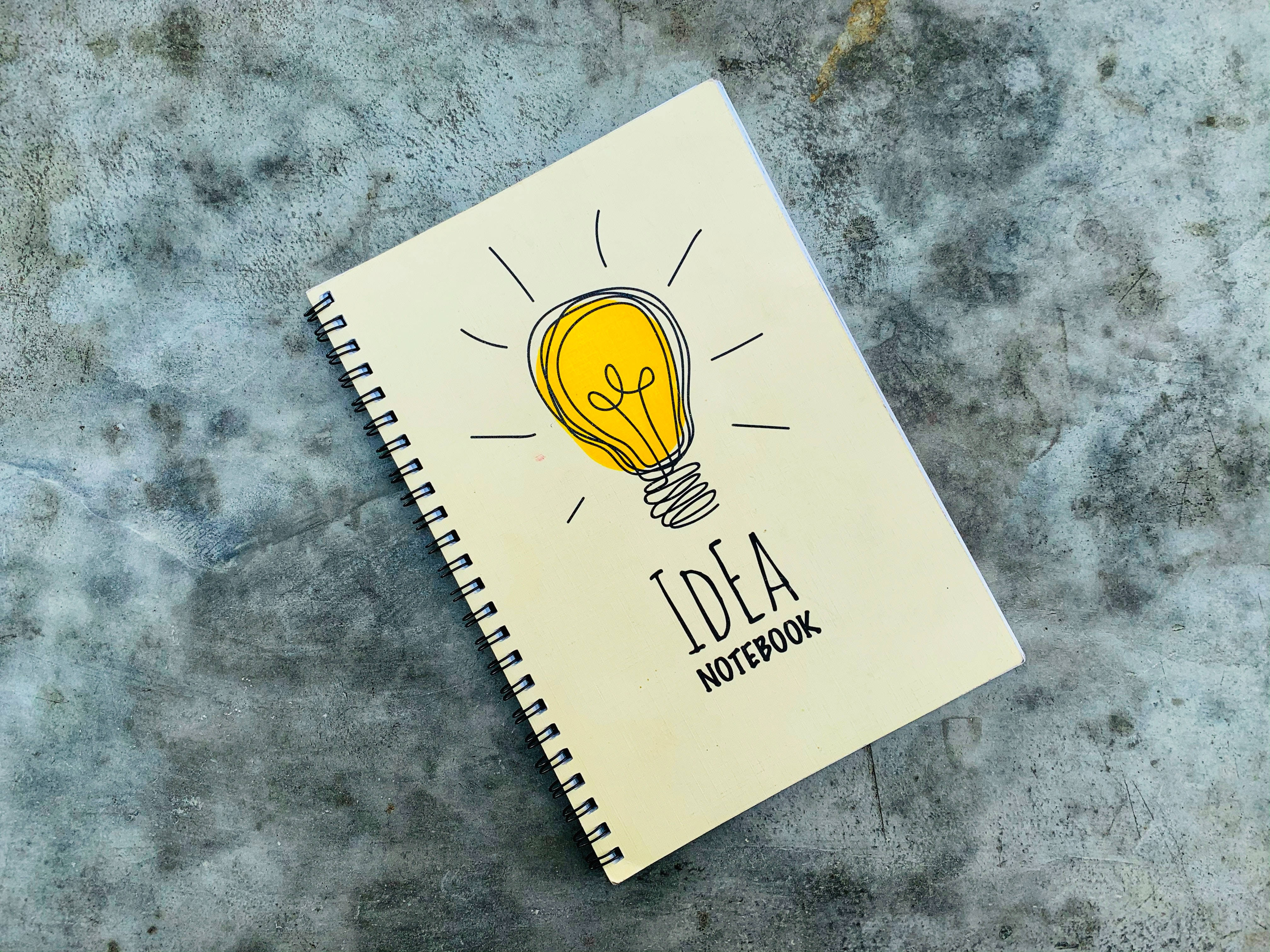 cream spiral notebook, yellow lightbulb doodle, IDEA NOTEBOOK, 4K Desktop Wallpaper