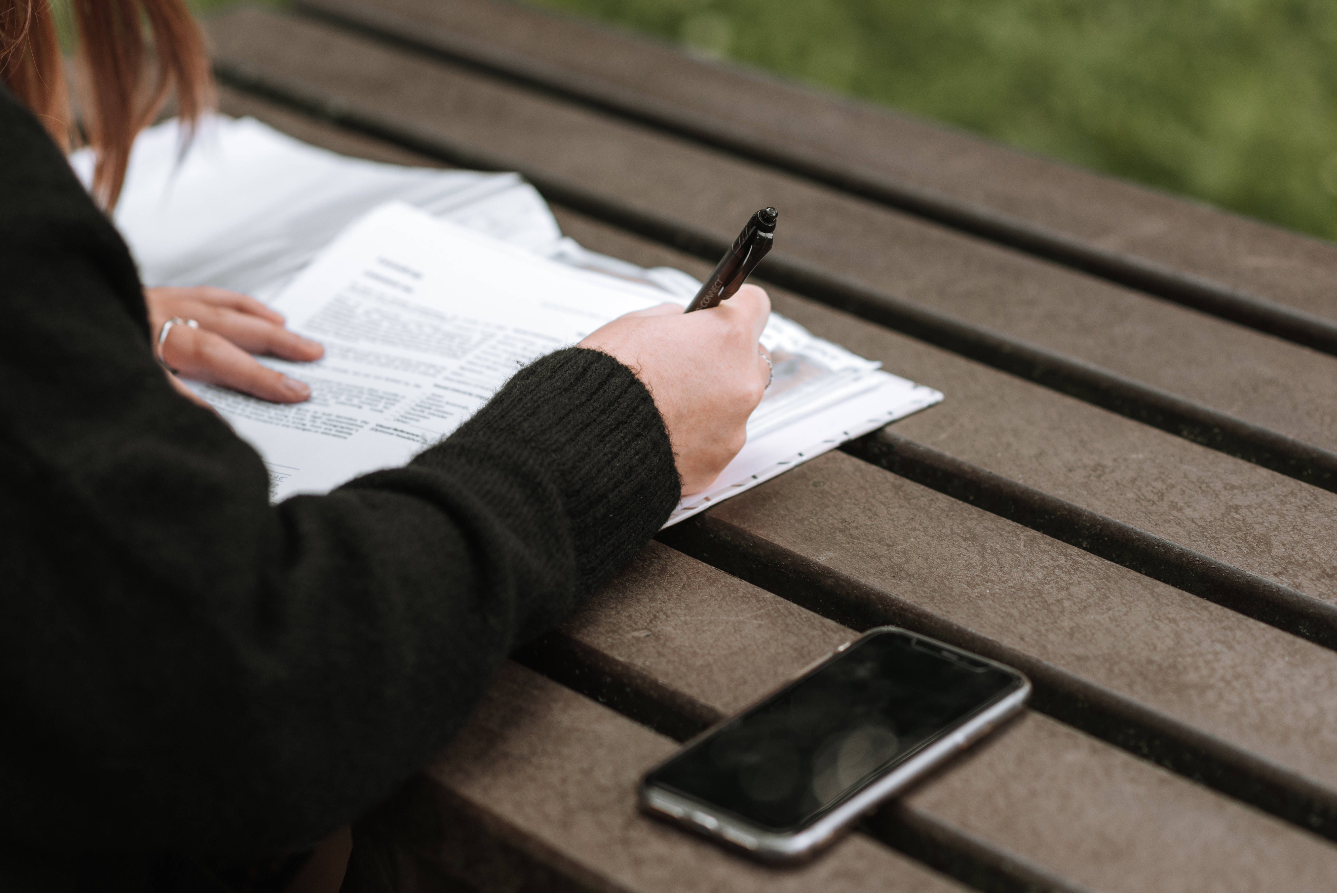 black sweater, wooden park bench, smartphone, 5K Desktop Wallpaper