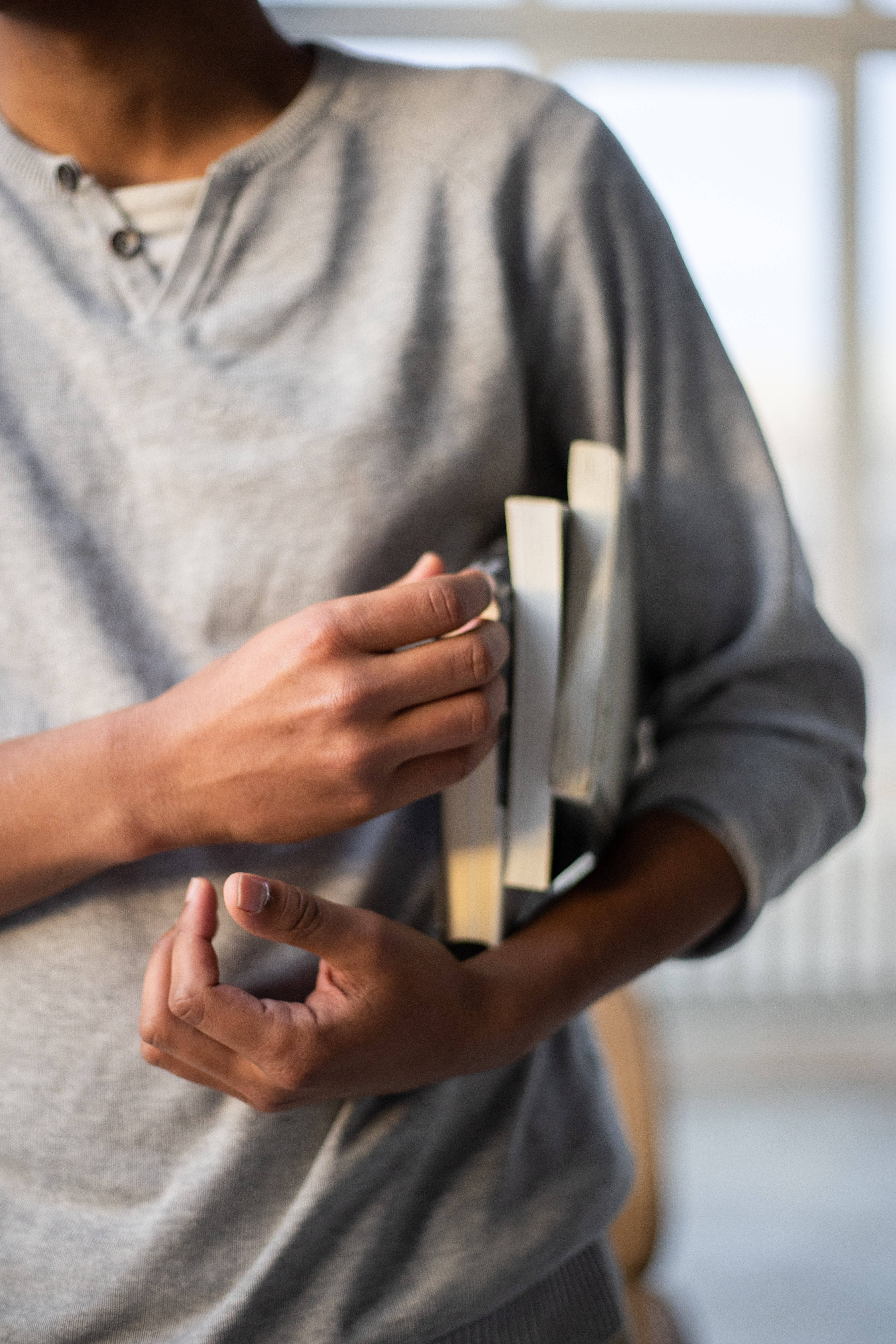 gray sweater, stack of books, hands, 5K Phone Wallpaper