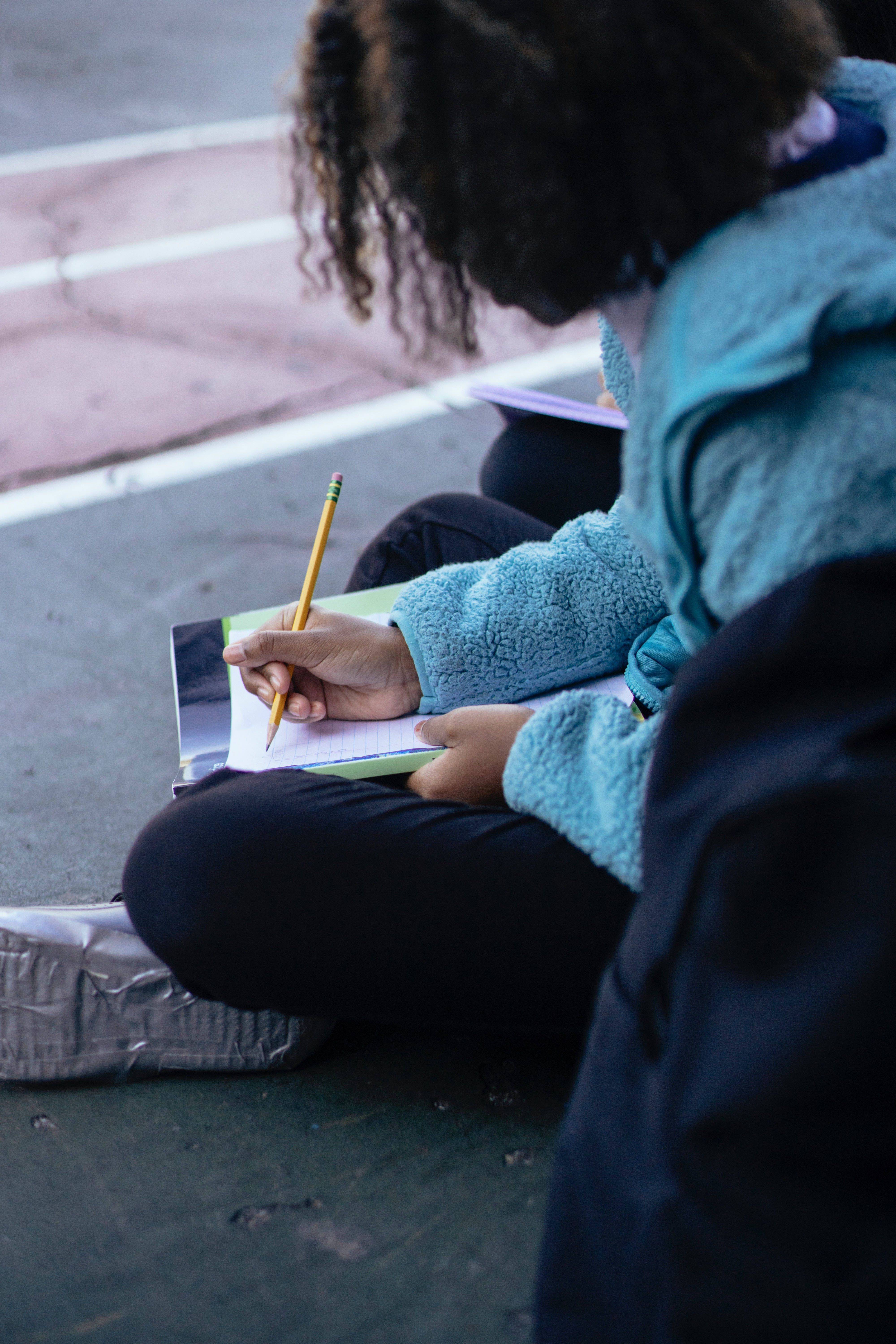 teal fleece jacket, pavement, notebook, 5K Phone Wallpaper
