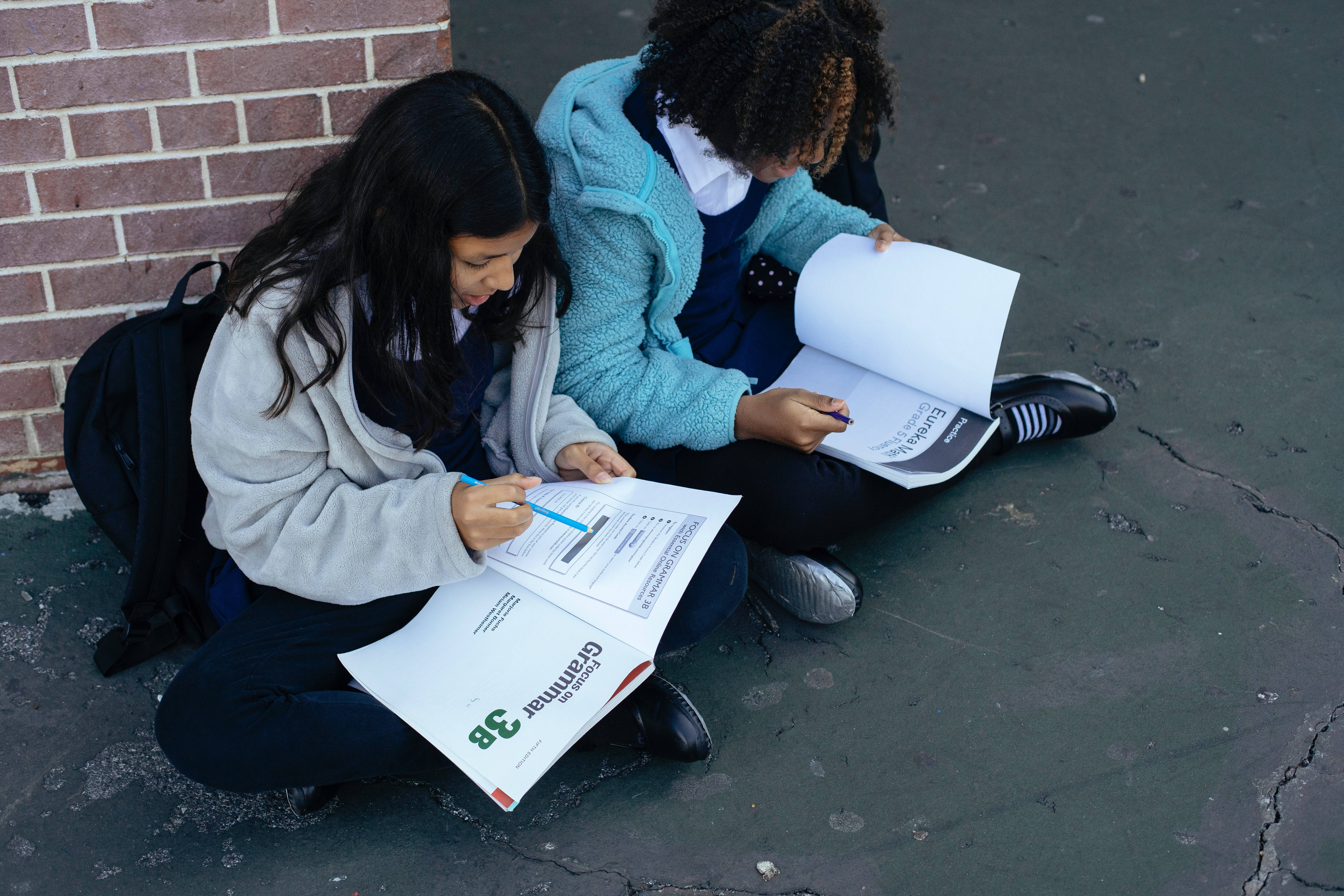 cracked pavement, brick wall, open grammar books, 5K Desktop Wallpaper