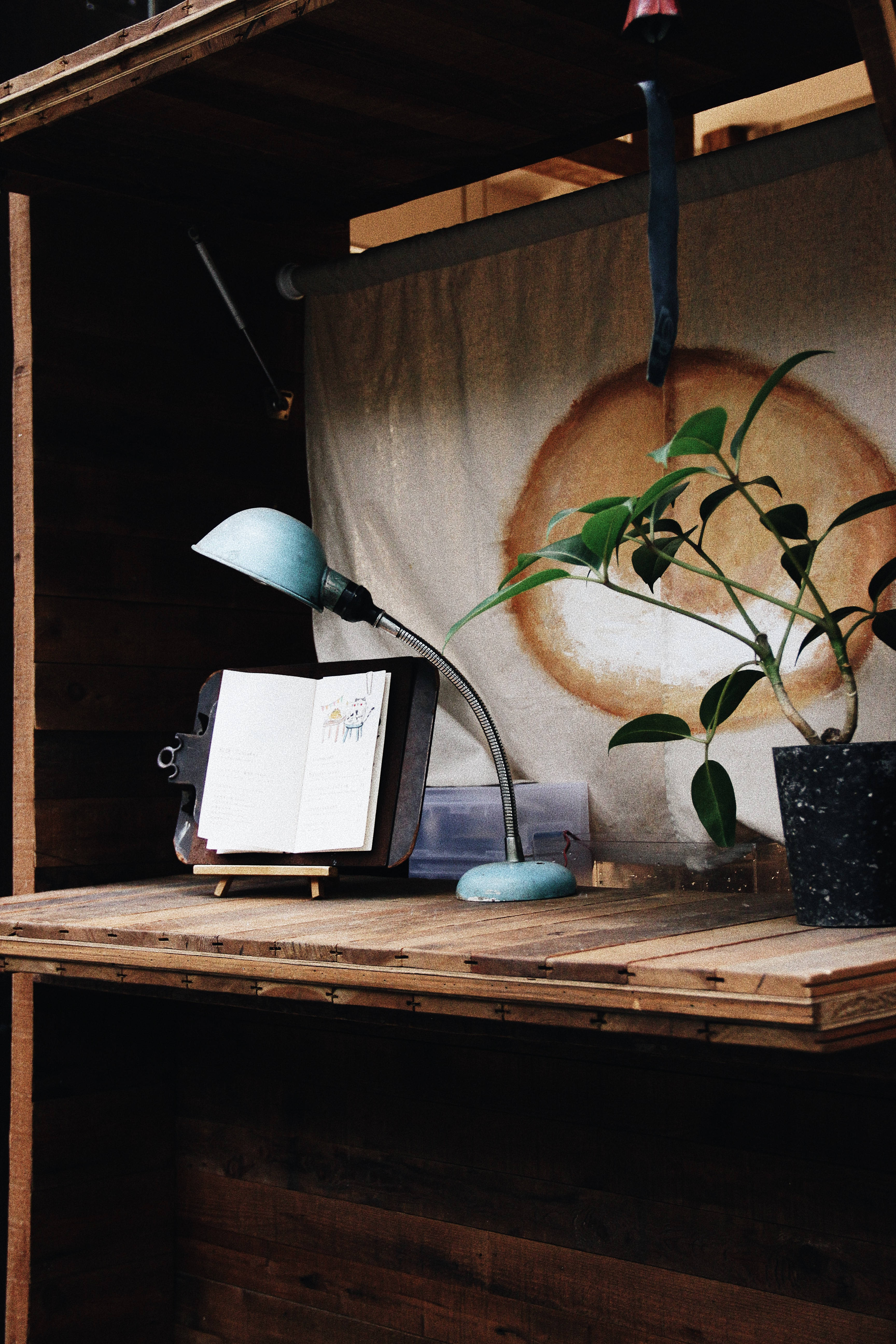 wooden desk, vintage blue lamp, open notebook, 5K Phone Wallpaper