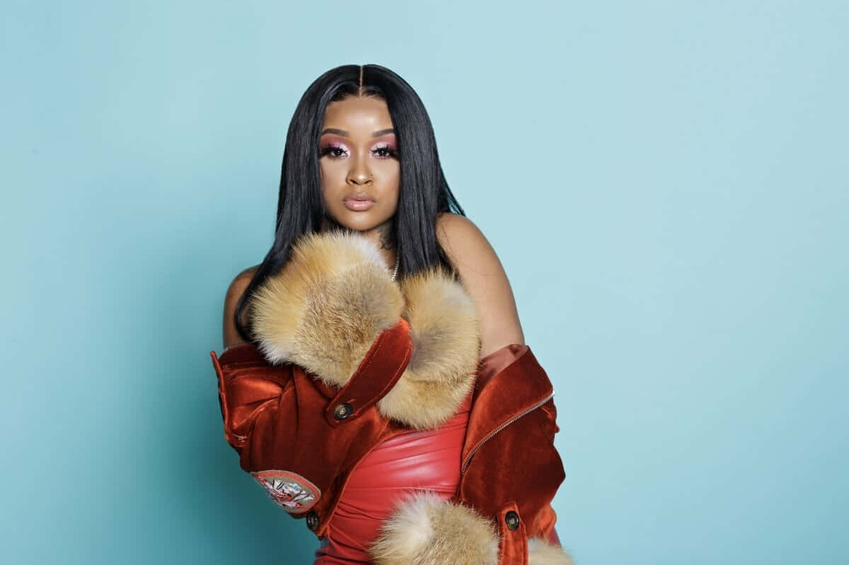 Stunna Girl, red velvet jacket, tan fur trim, SD Desktop Wallpaper