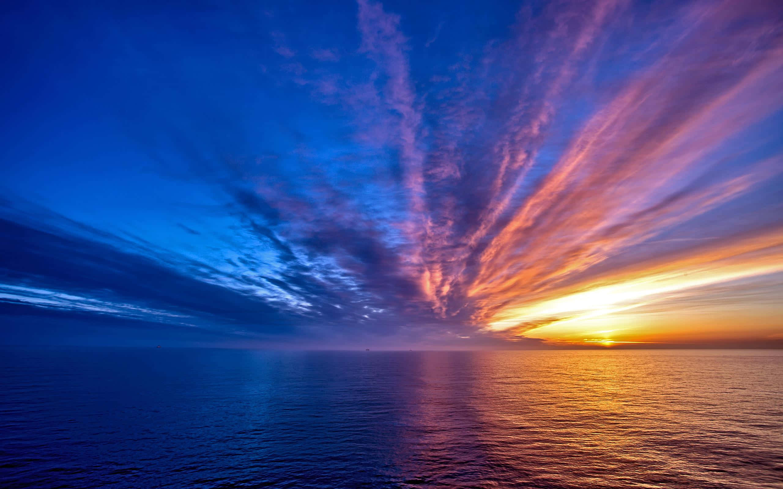 Stunning Sea Horizon, sunset, calm ocean waters, 2K Desktop Wallpaper