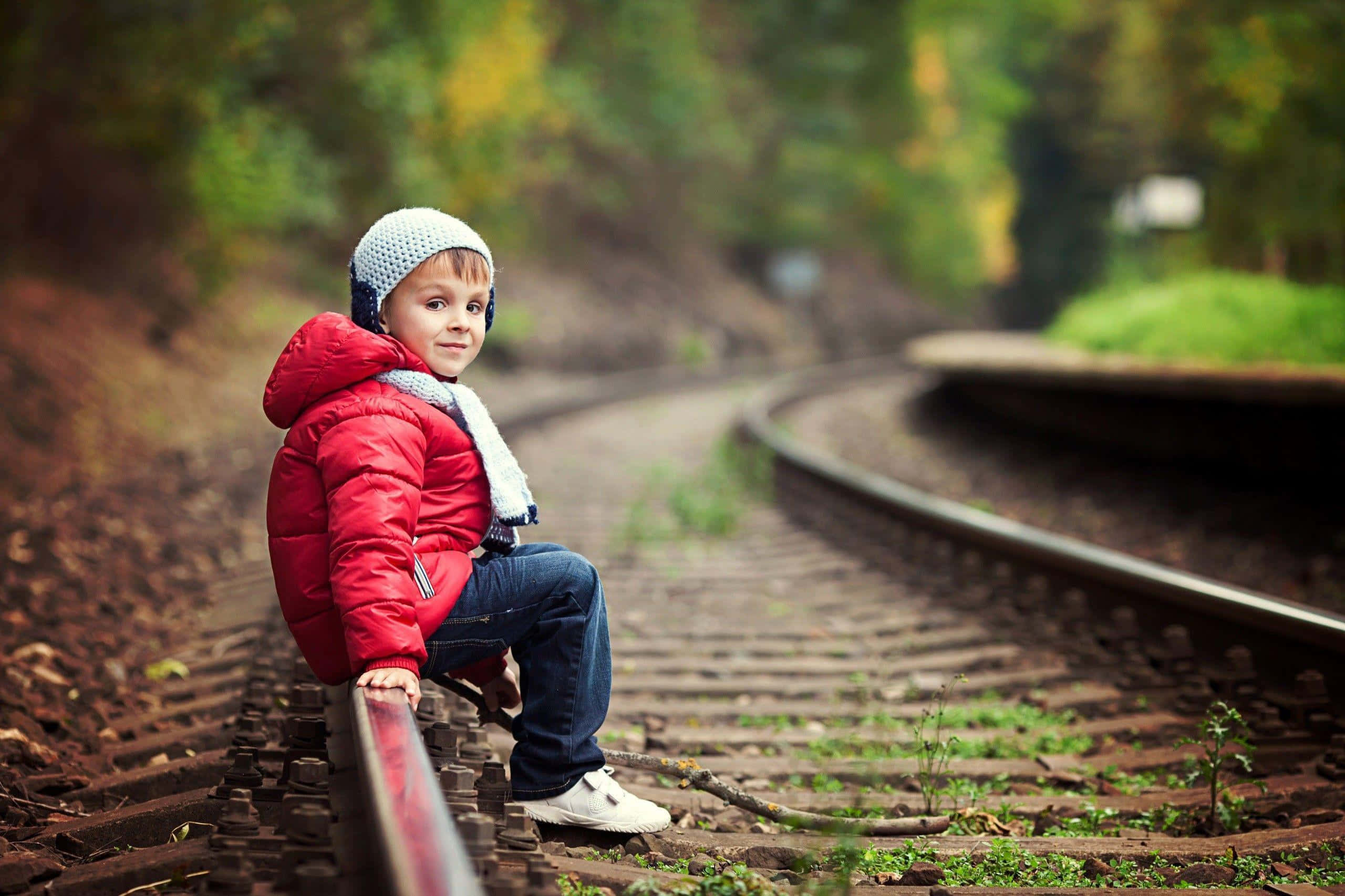 red jacket, knit hat, rusty train track, 2K Desktop Wallpaper