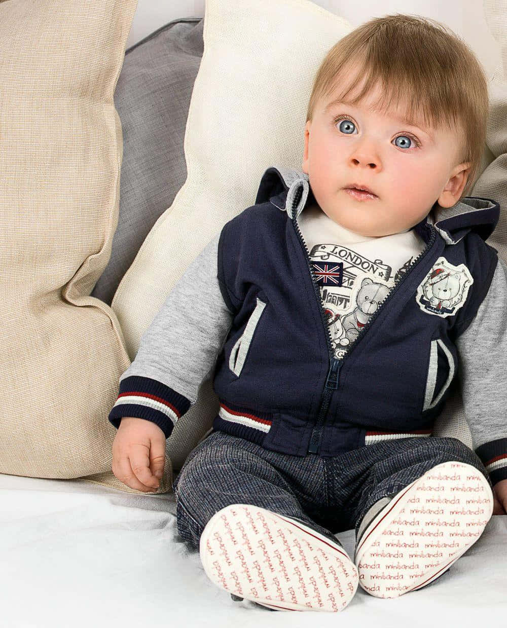 cute baby stylish boy, bright blue eyes, soft couch, SD Phone Wallpaper