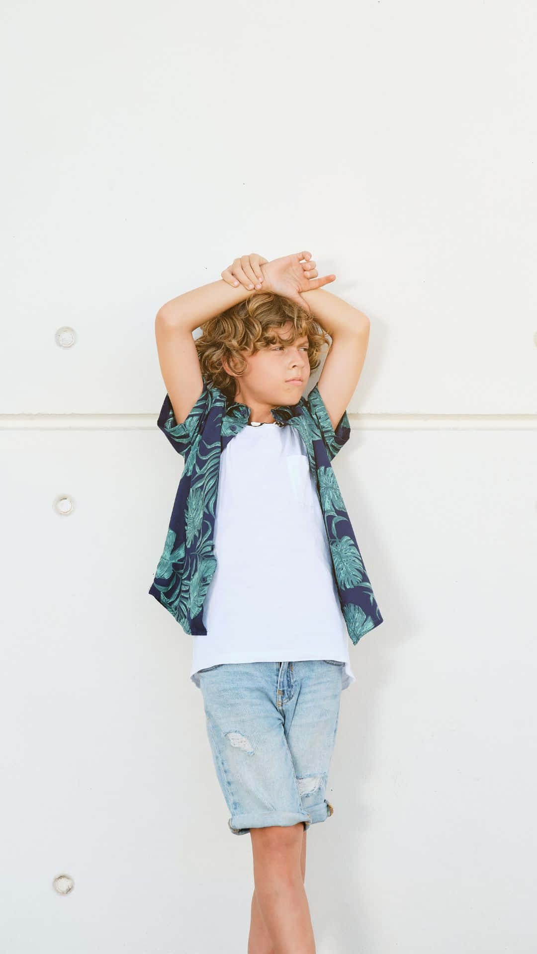 curly hair, plain white wall, patterned shirt, Full HD Phone Wallpaper