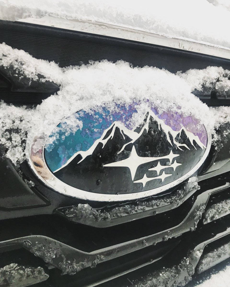 Subaru emblem, black car hood, mountain range, SD Phone Wallpaper