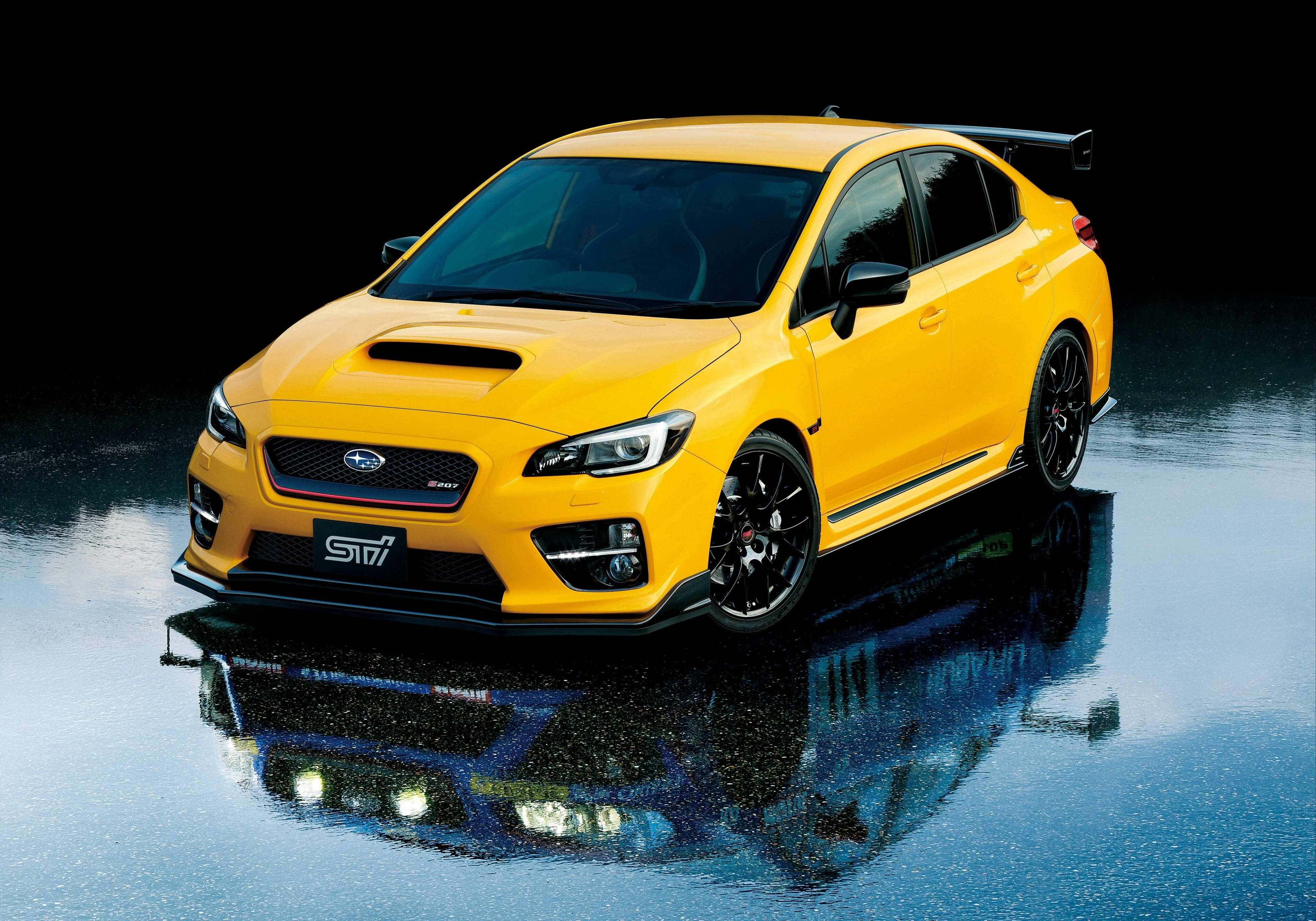 Yellow Subaru WRX STI, sedan, wet reflective surface, 4K Desktop Wallpaper