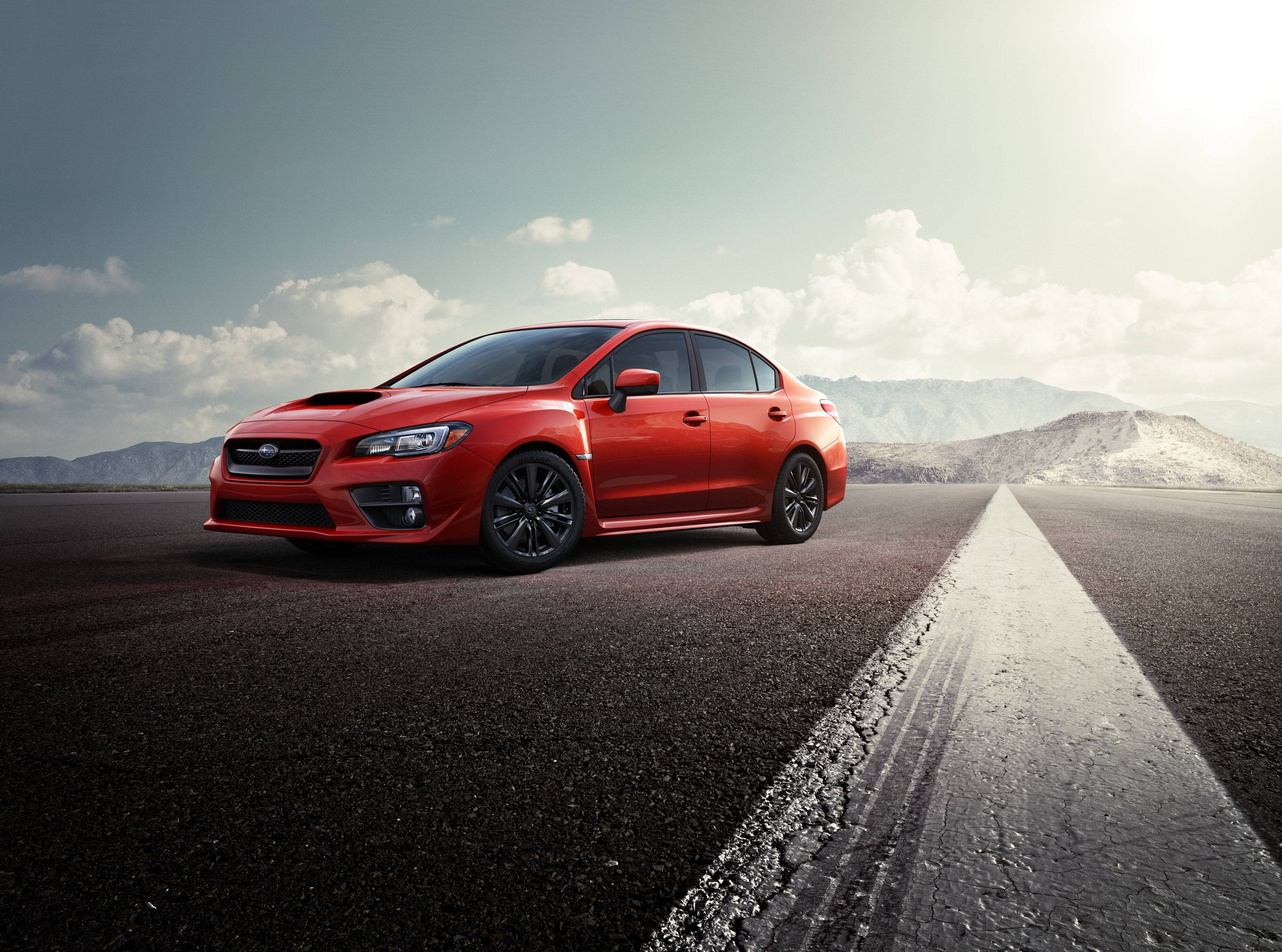 Red Subaru WRX STI, cracked asphalt road, mountains, 4K Desktop Wallpaper