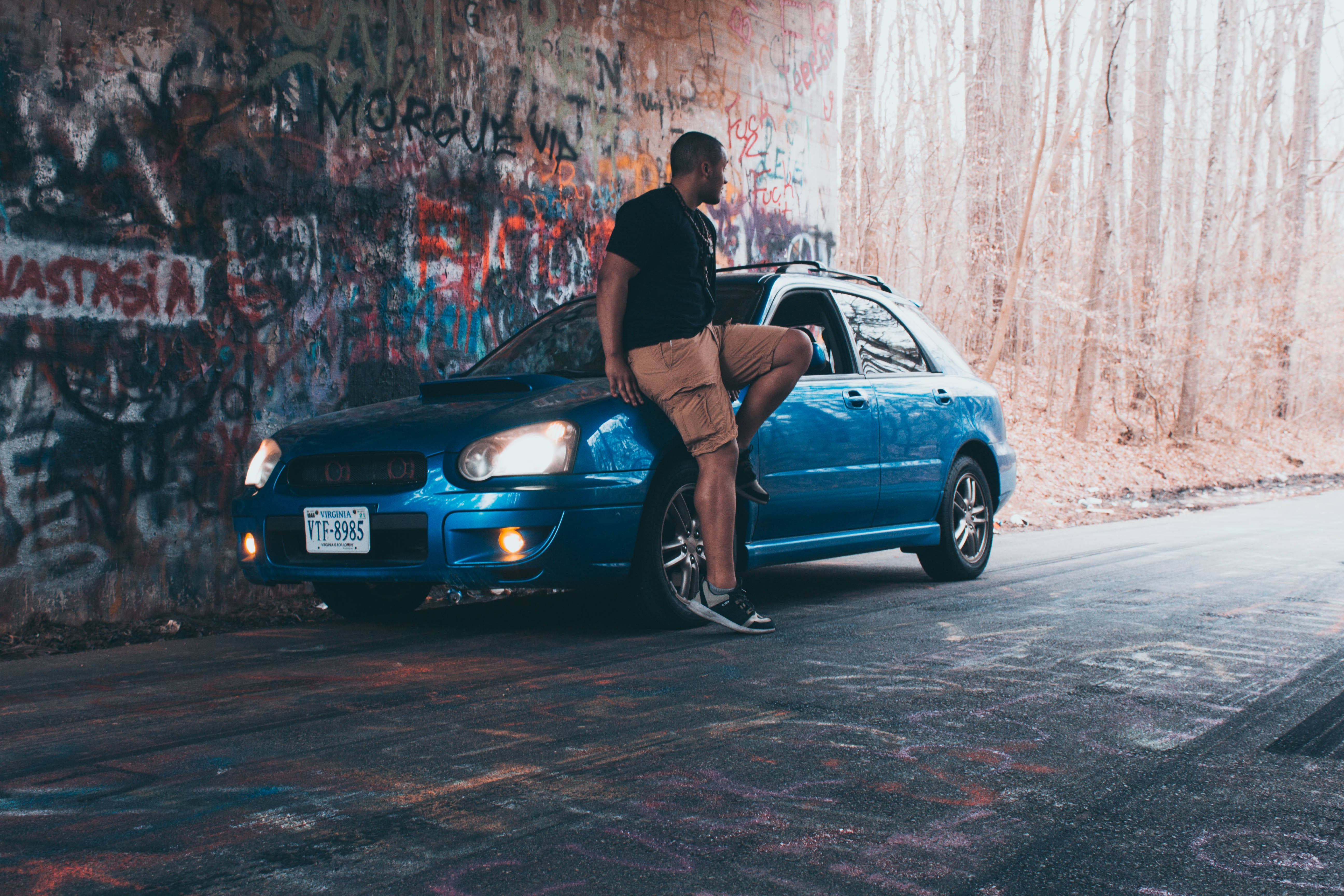 Subaru WRX STI, vibrant blue, graffiti-covered wall, 5K Desktop Wallpaper