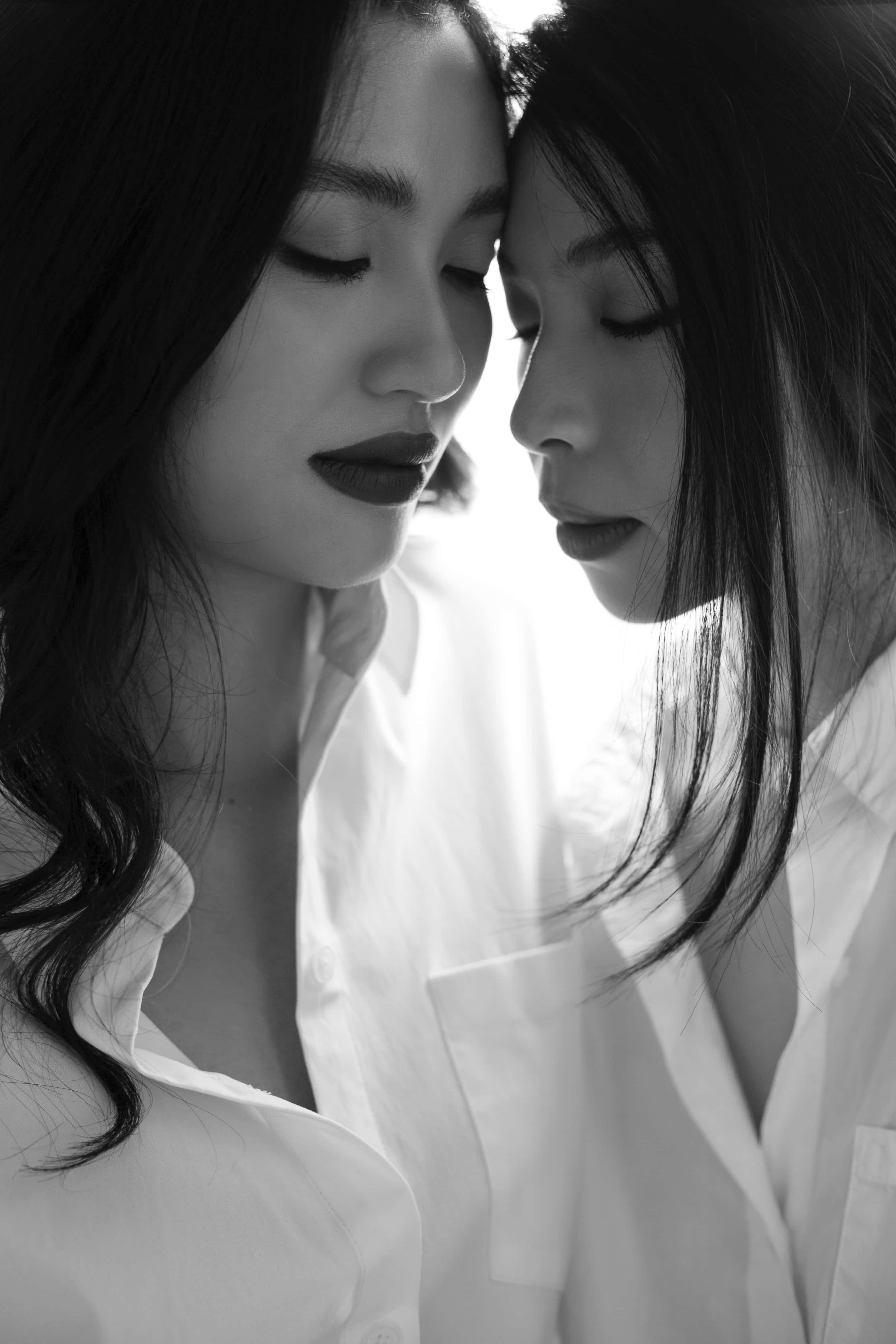 black and white, white shirts, foreheads together, 4K Phone Wallpaper