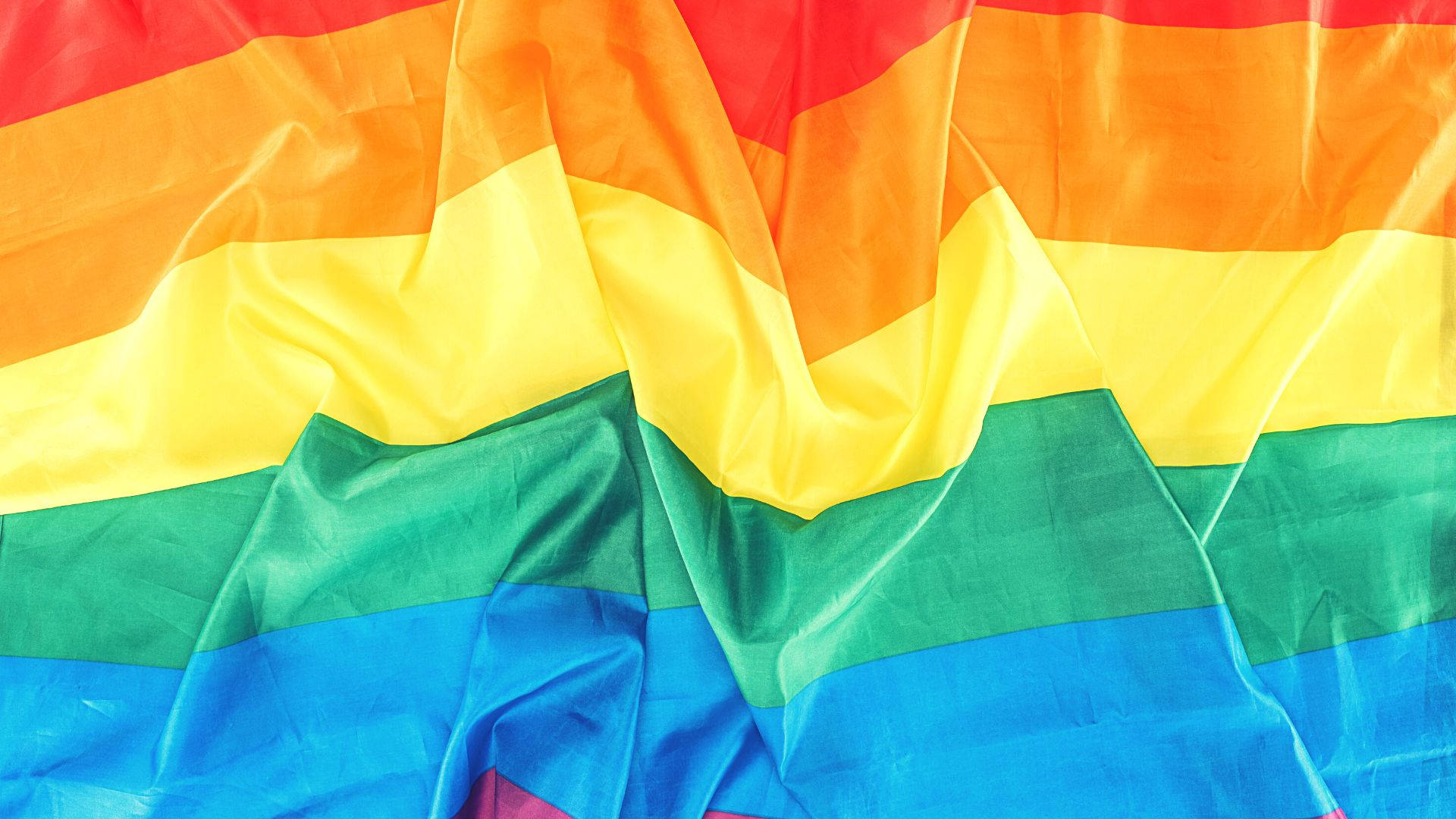 rainbow flag, flowing fabric folds, close-up shot, Full HD Desktop Wallpaper