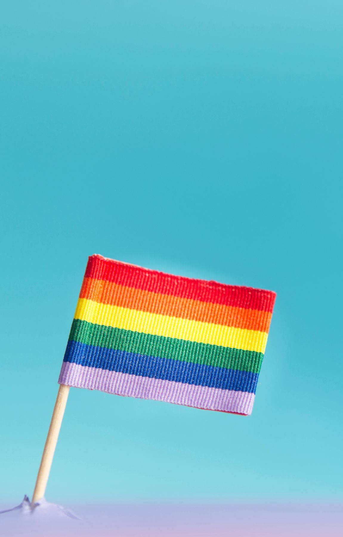 rainbow flag, lavender soil, soft blue gradient background, HD Phone Wallpaper