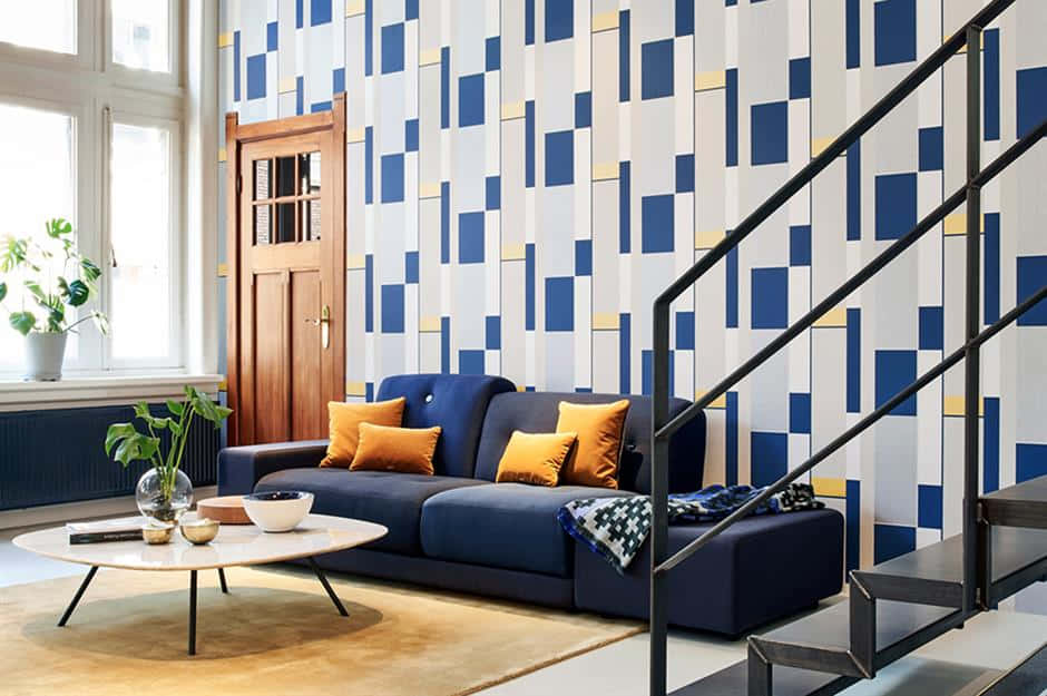blue geometric wallpaper, orange cushions, black metal staircase, SD Desktop Wallpaper