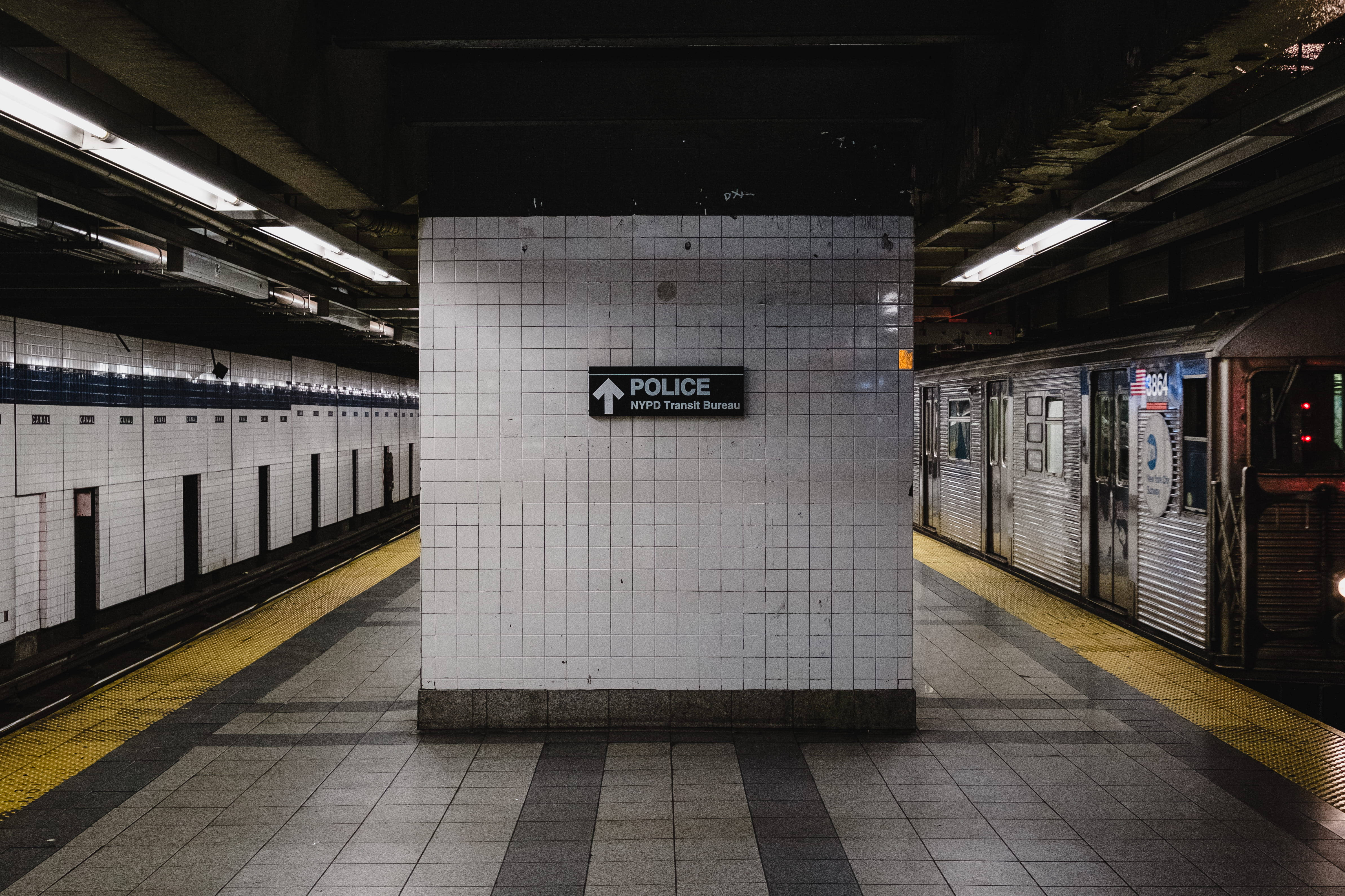 police sign, white tiled walls, subway station, 4K Desktop Wallpaper