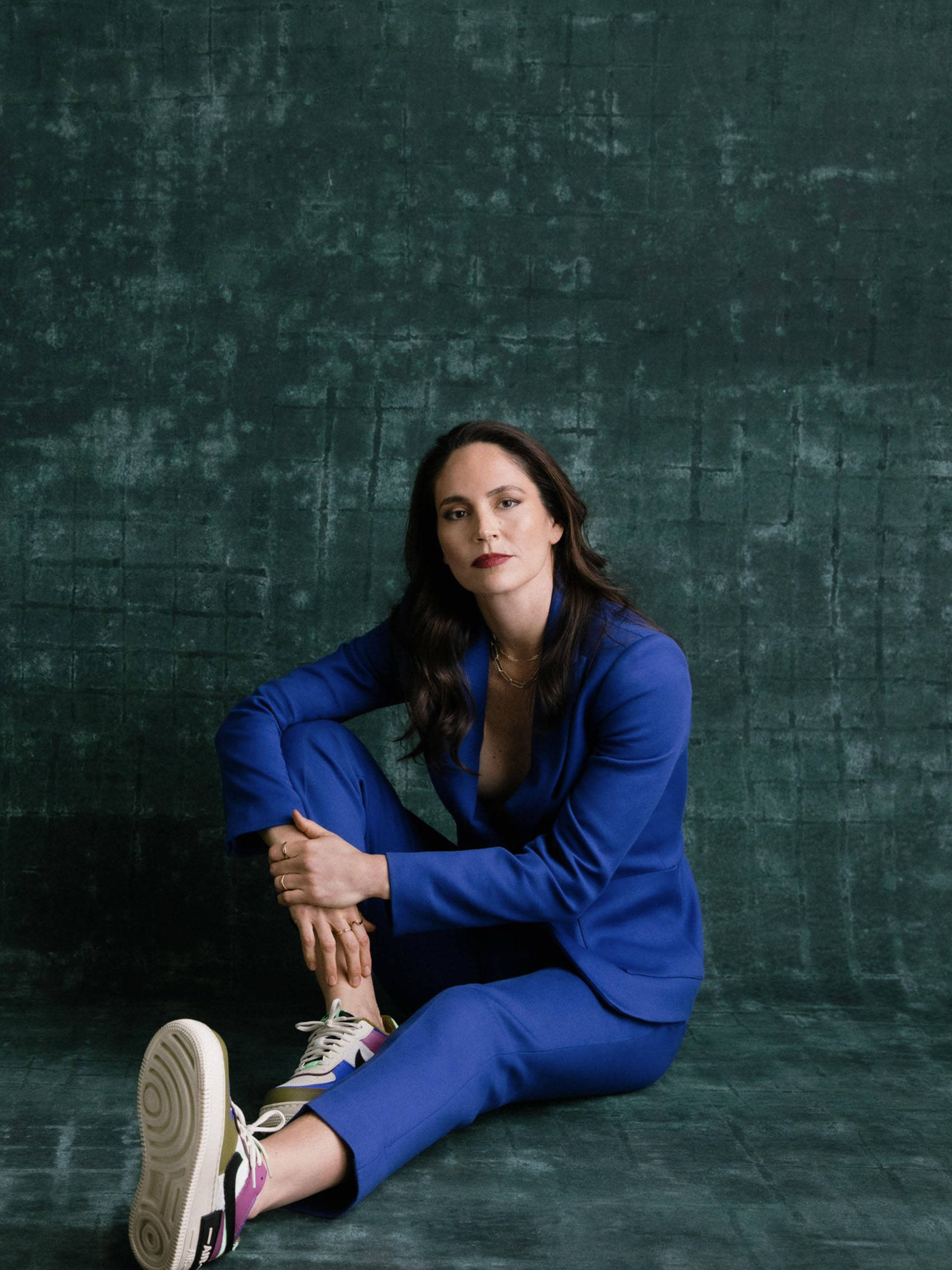 Sue Bird, bold blue suit, sneakers, 2K Phone Wallpaper