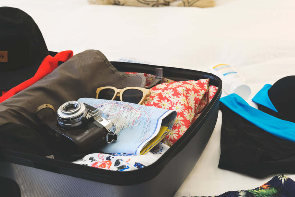 suitcase, colorful clothes, sunglasses, SD Desktop Wallpaper