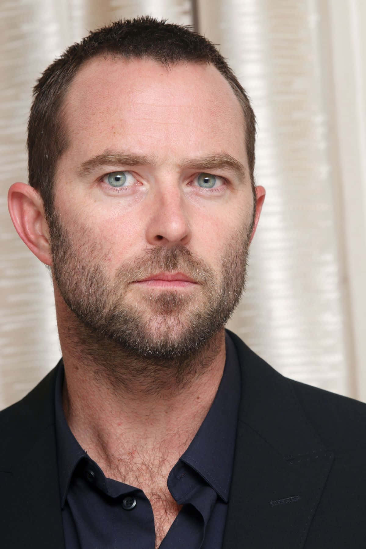 Sullivan Stapleton, blue eyes, stubble, HD Phone Wallpaper