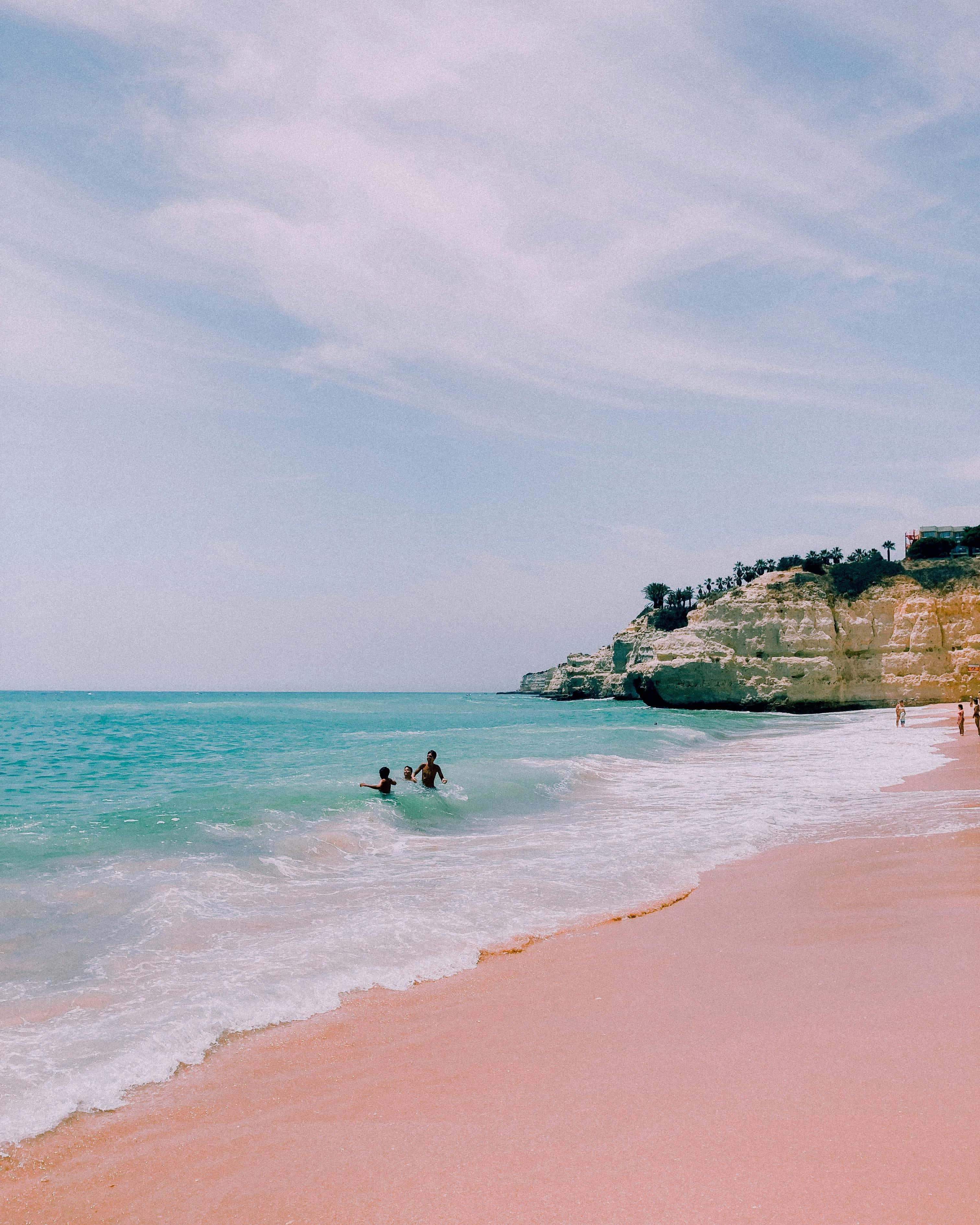 pink sand, turquoise water, rocky cliff, 2K Phone Wallpaper