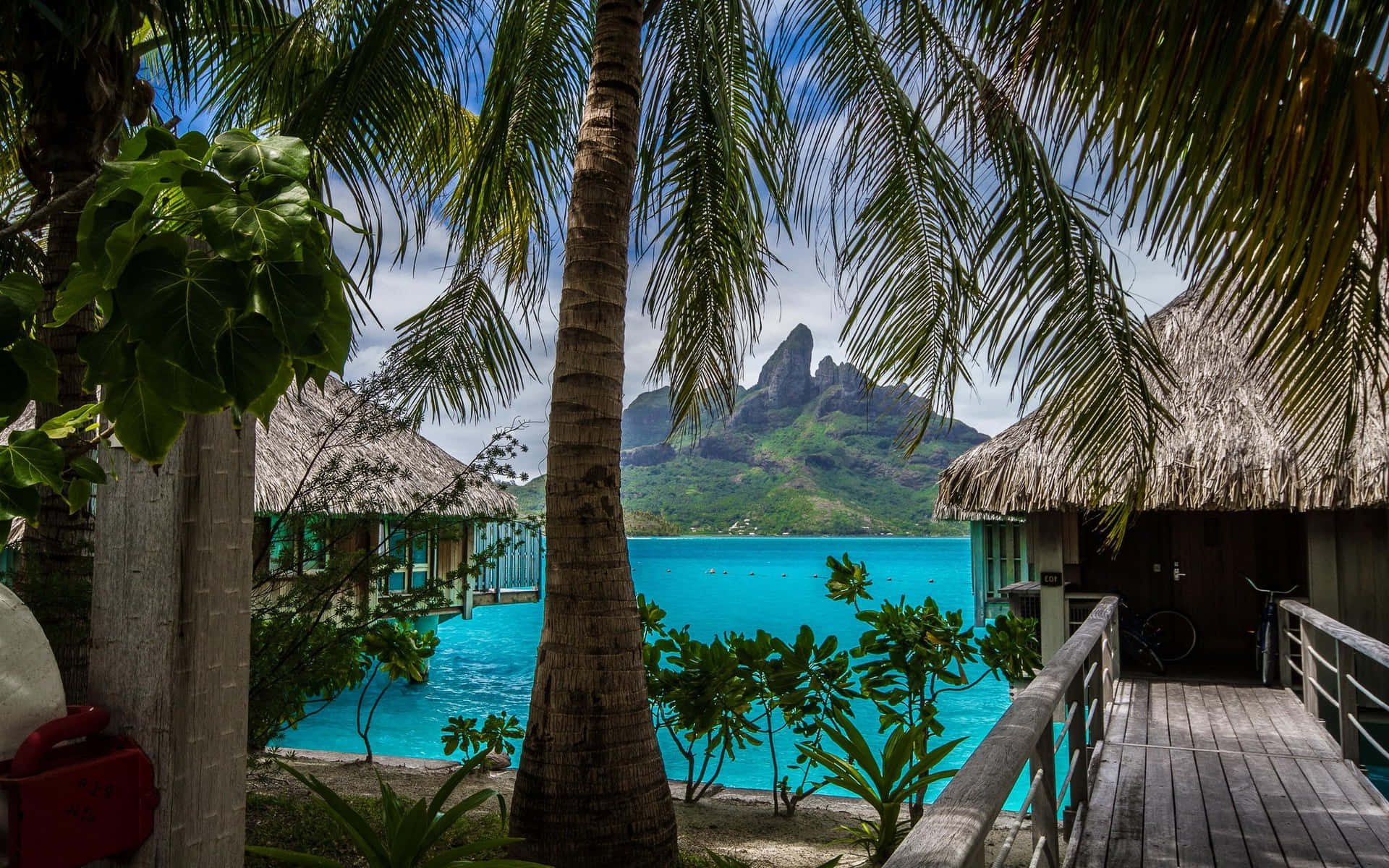 tropical overwater bungalows, thatched roofs, vibrant turquoise lagoon, Full HD Desktop Wallpaper