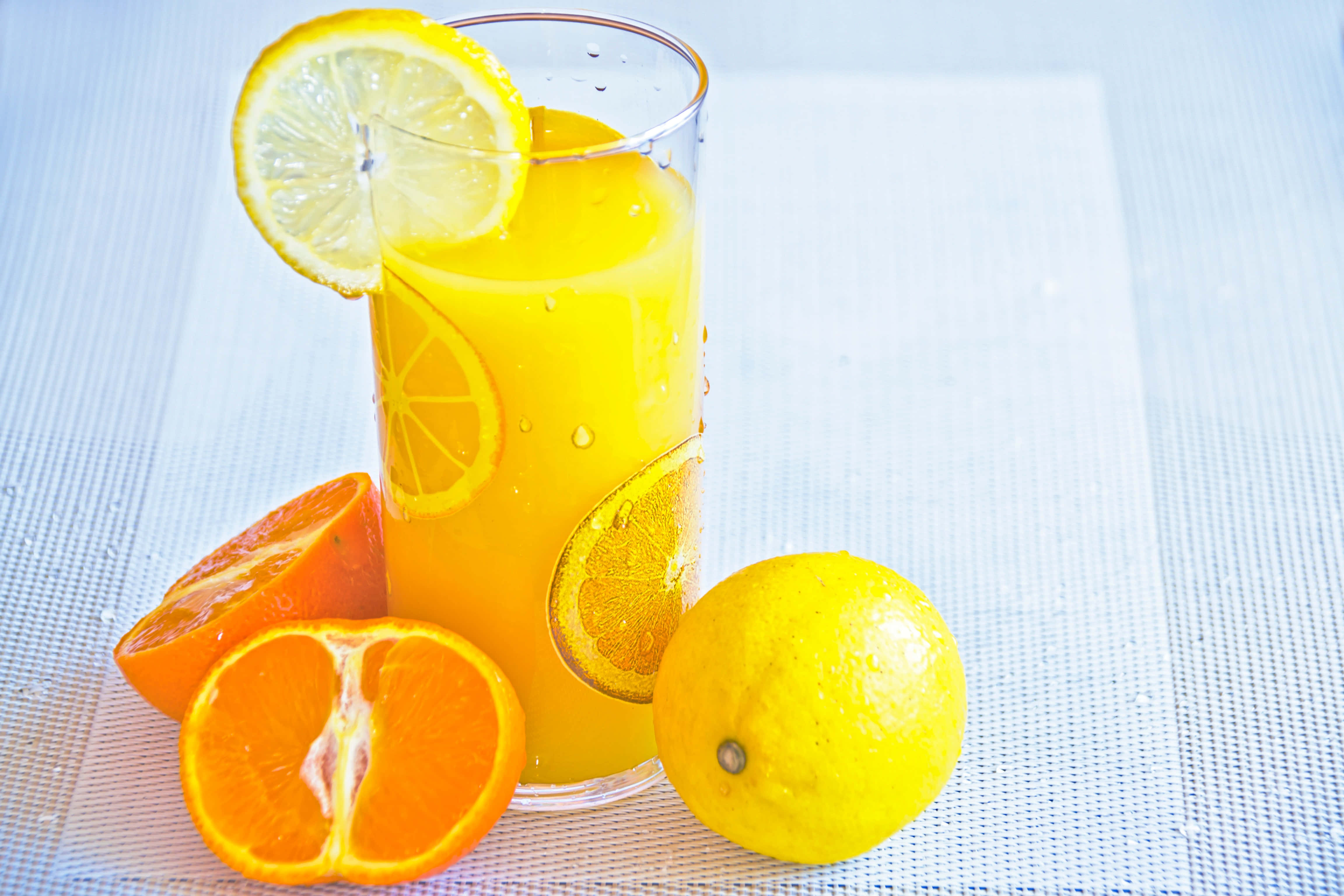 Summer Drinks, vibrant orange juice, lemon slices, 4K Desktop Wallpaper