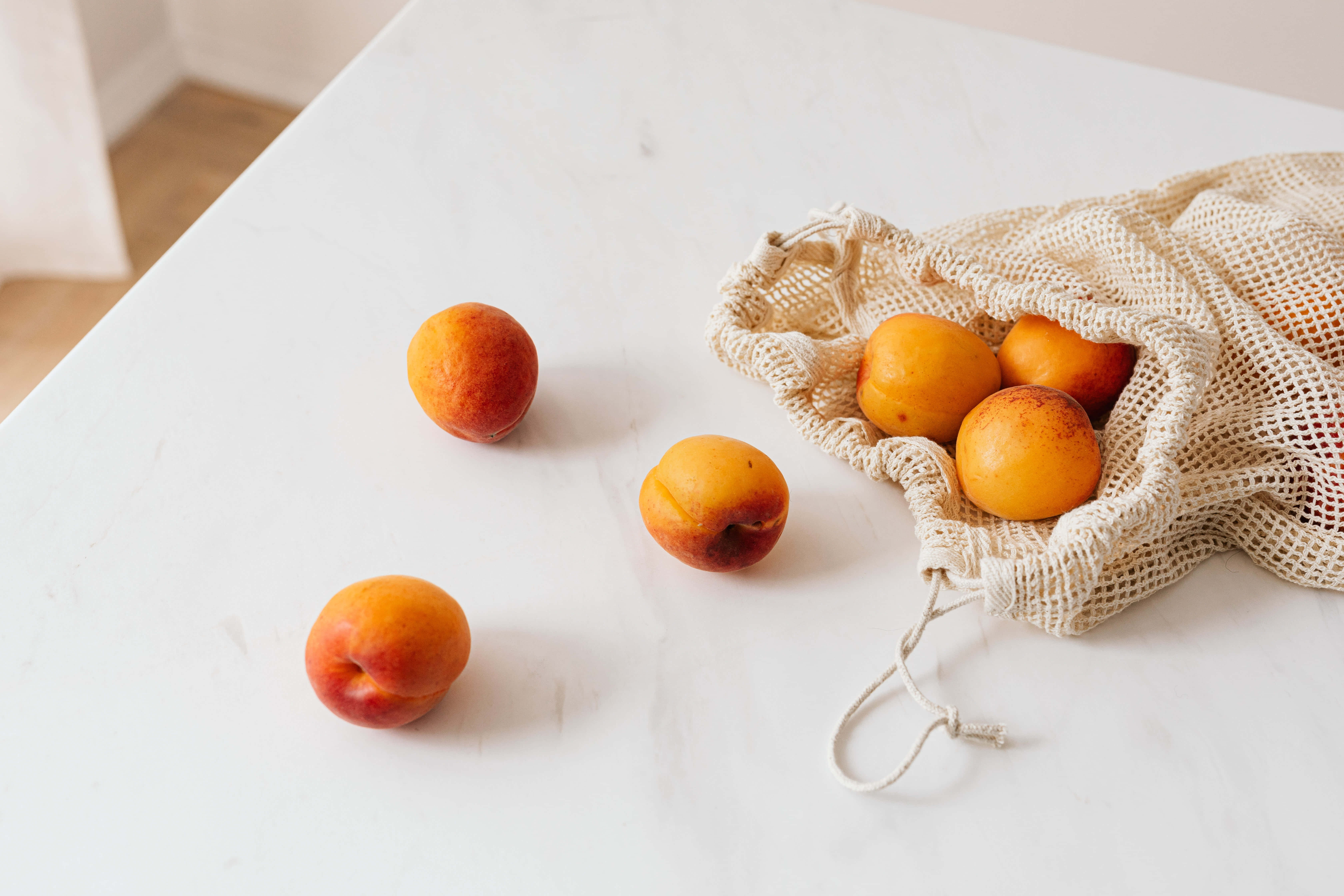 summer fruits, apricots, beige mesh bag, 5K Desktop Wallpaper