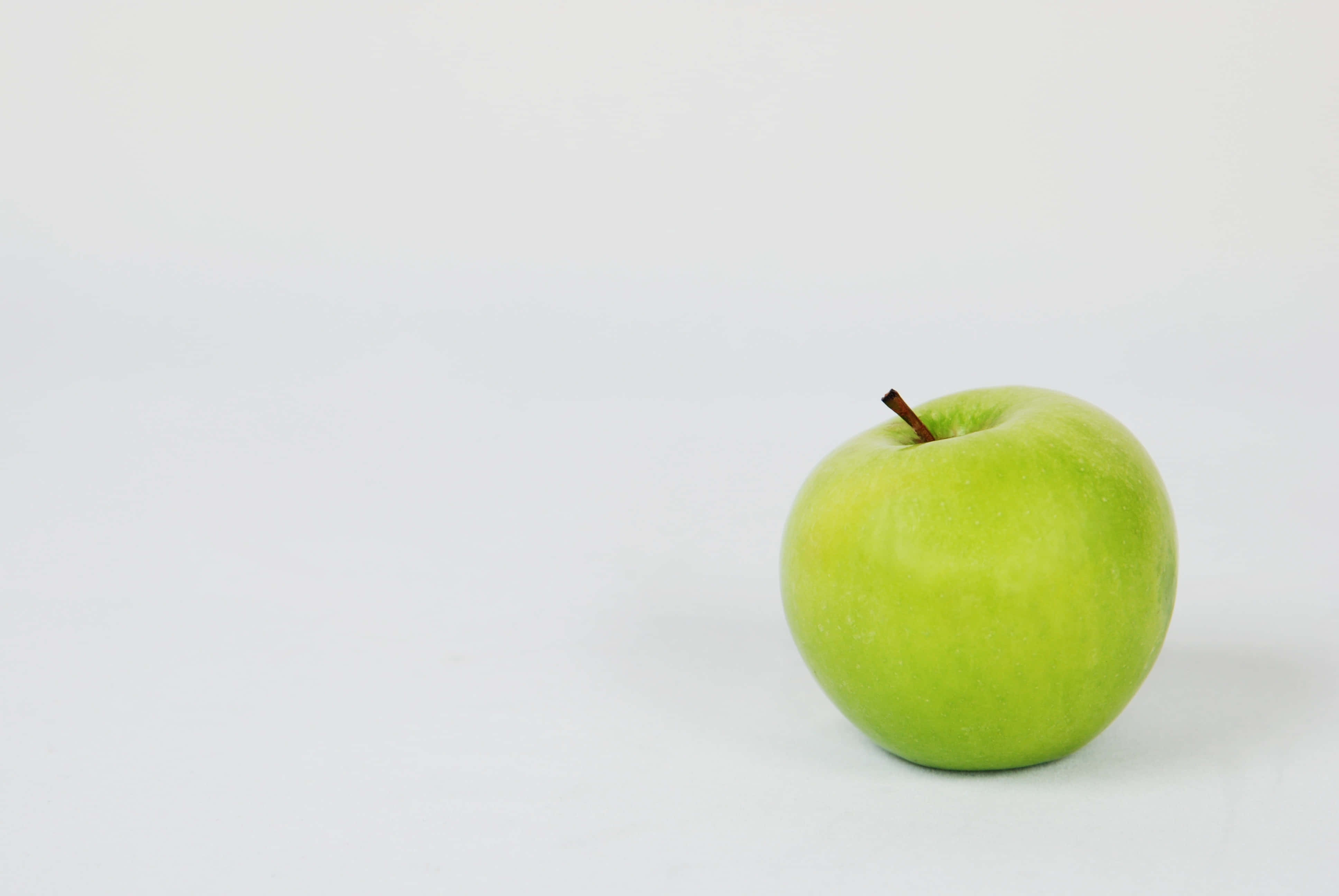 summer fruits, crisp green apple, clean white surface, 4K Desktop Wallpaper