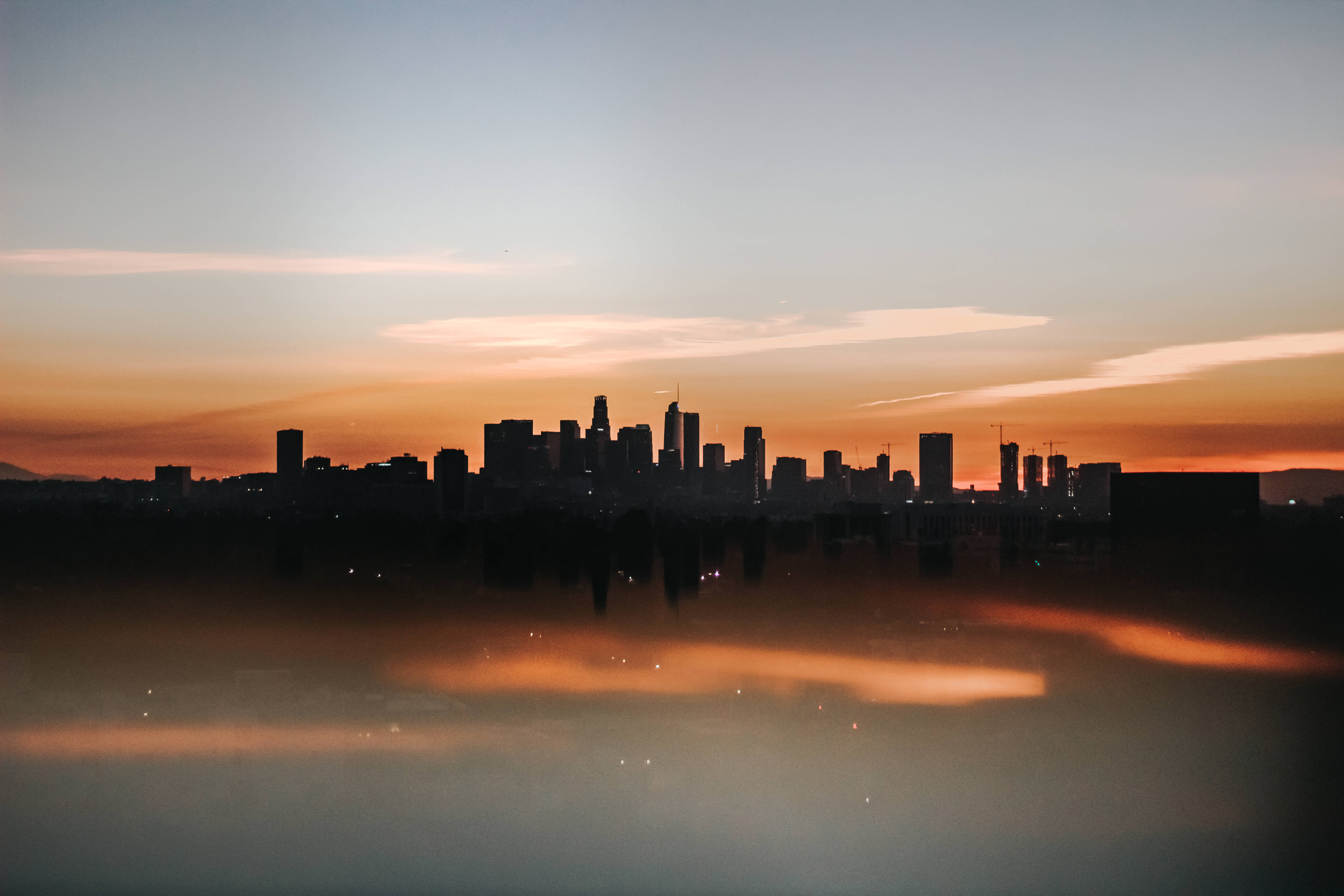 Golden Hour City Cool iPad, city skyline, warm sunset sky, 5K Desktop Wallpaper