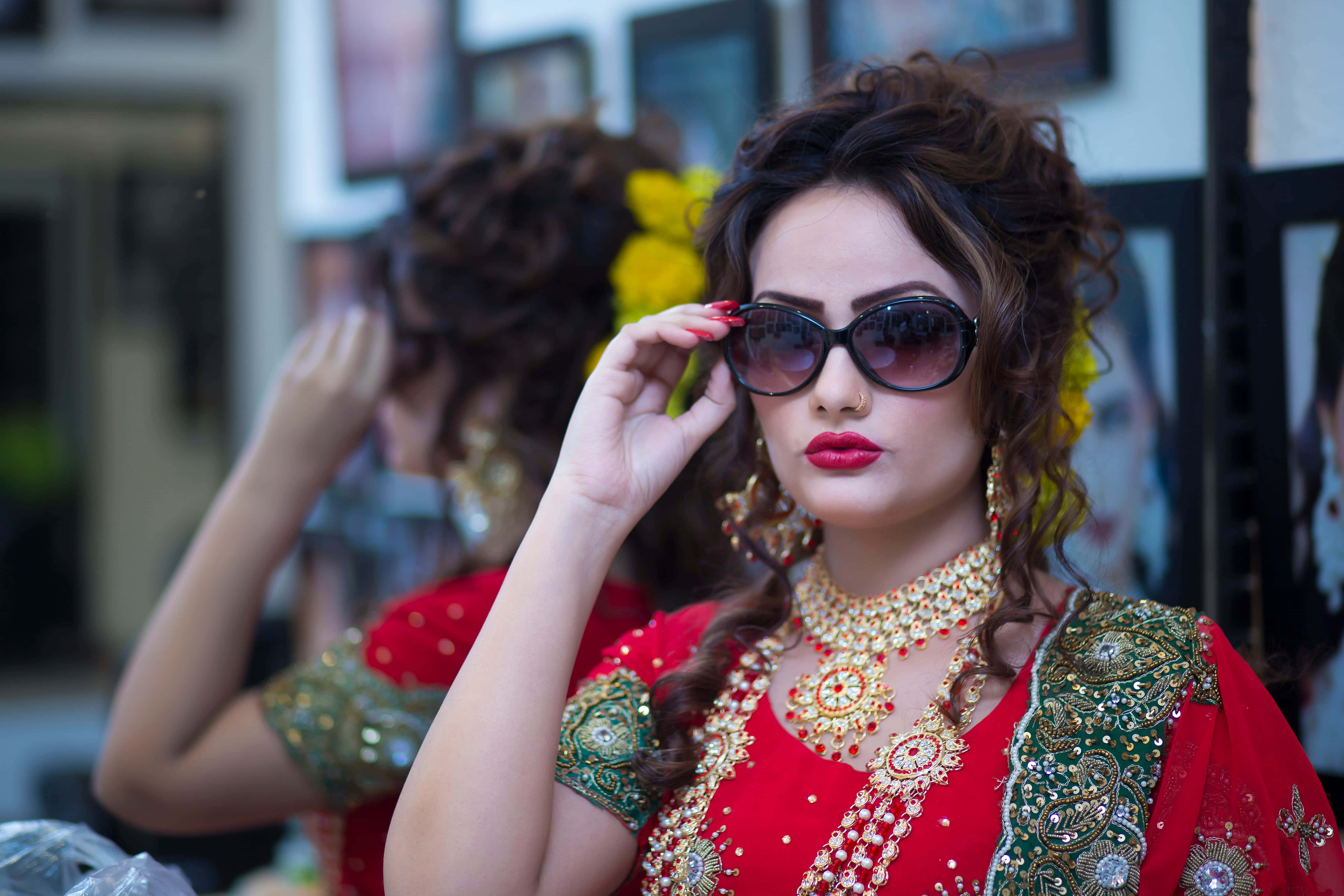 sunglasses, beach setting, vibrant red embroidered outfit, 5K Desktop Wallpaper