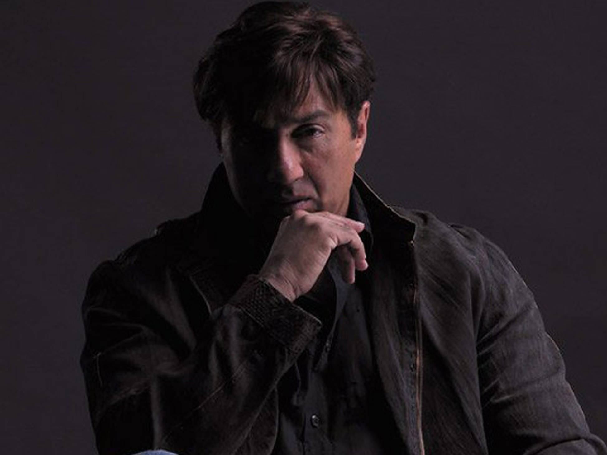 Sunny Deol, dark jacket, shadowy background, Full HD Desktop Wallpaper