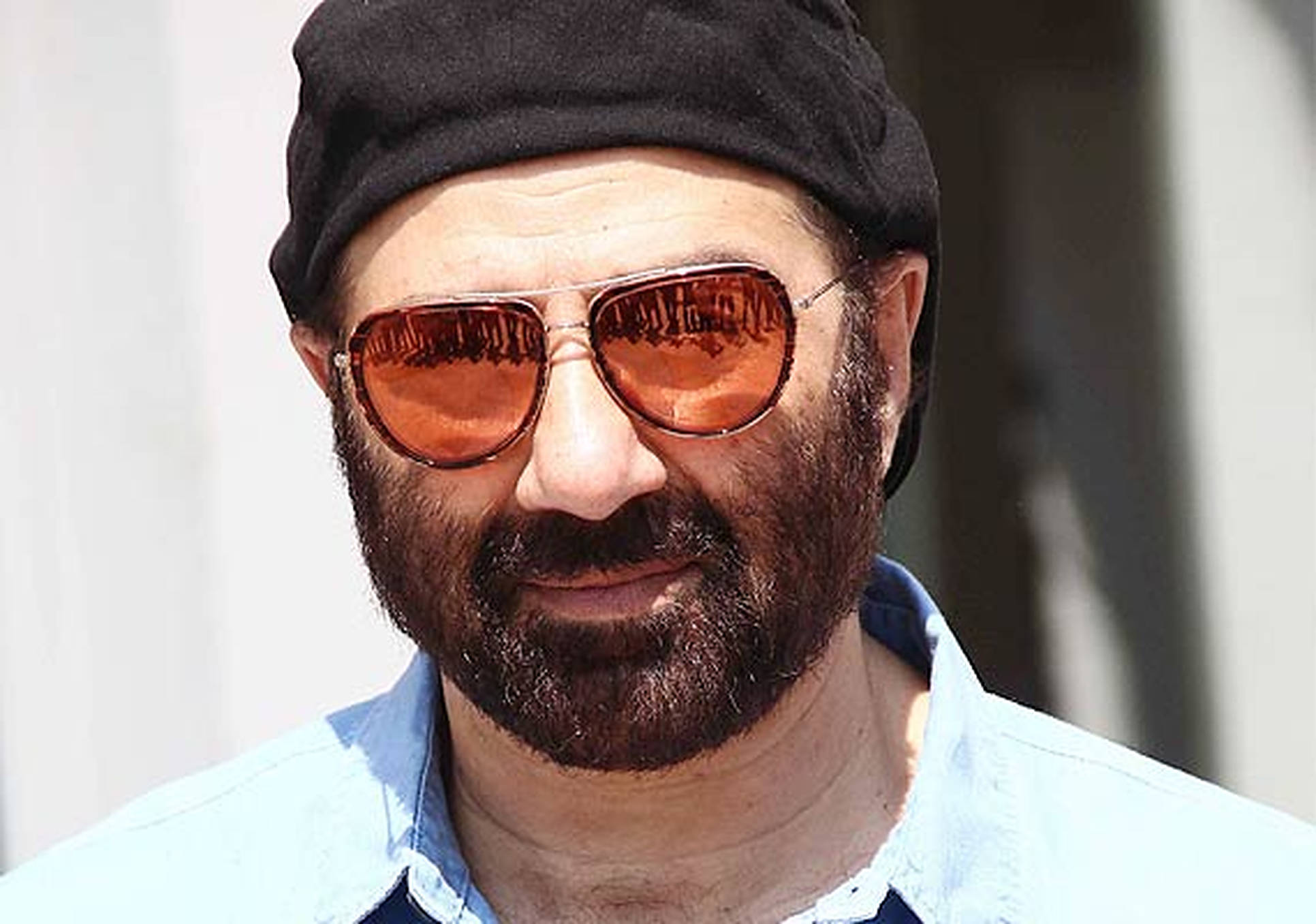 Sunny Deol, orange-tinted aviator sunglasses, black beanie, Full HD Desktop Wallpaper