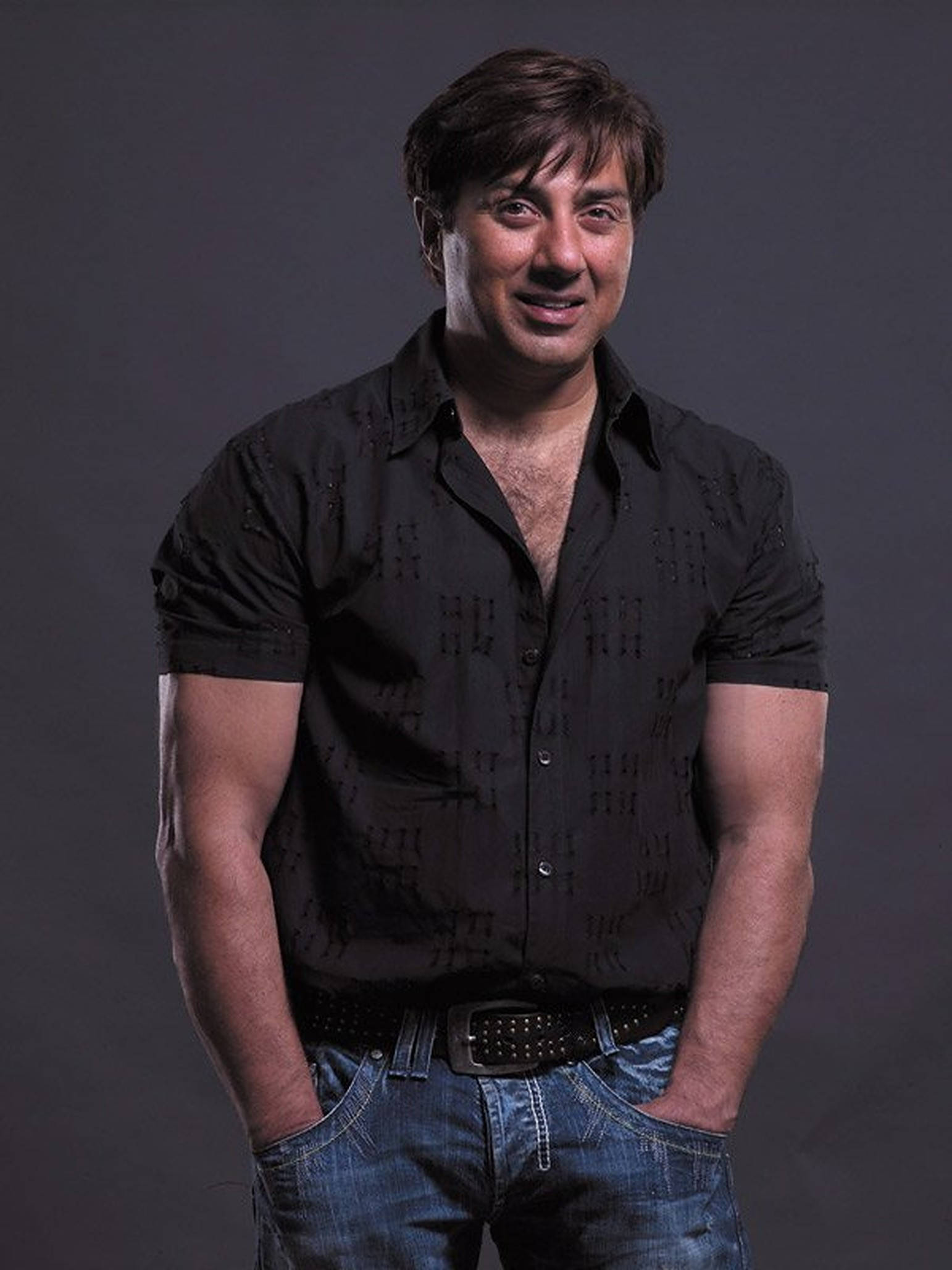 Sunny Deol, black patterned shirt, blue jeans, Full HD Phone Wallpaper
