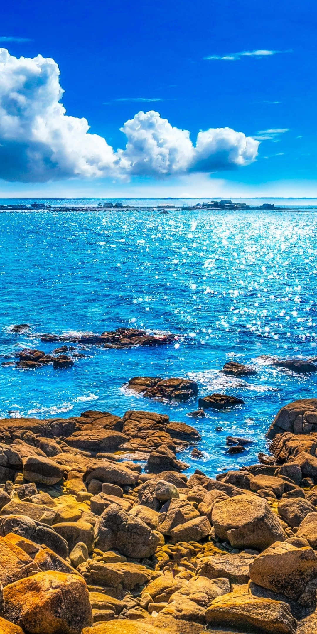 Sunny Day, blue ocean, golden-brown rocky shores, Full HD Phone Wallpaper