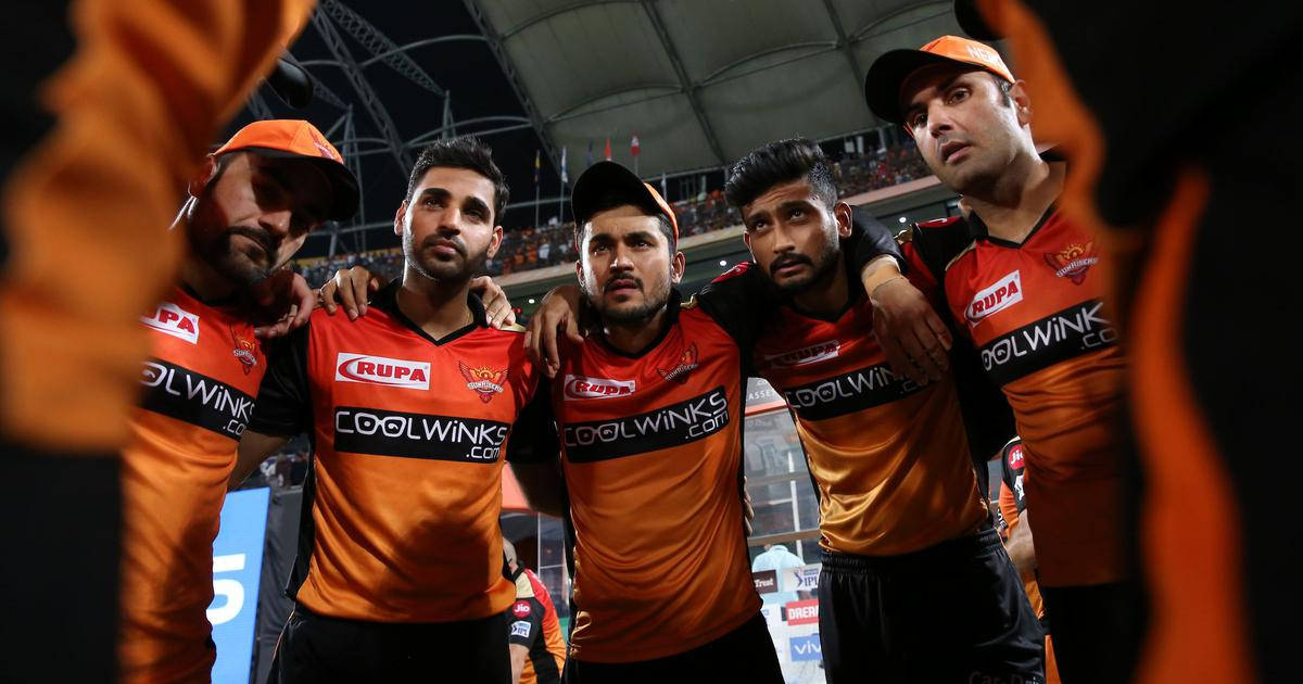 Sunrisers Hyderabad, orange jerseys, stadium lights, SD Desktop Wallpaper