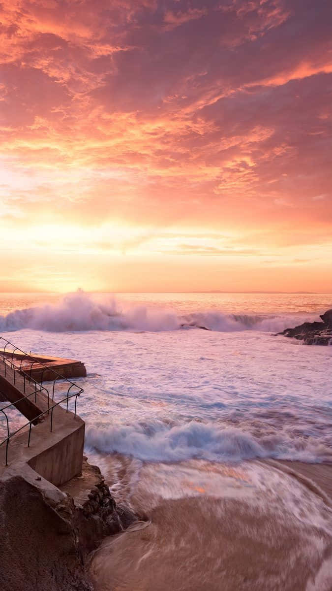 Sunset Beach iPhone, fiery orange and pink sunset sky, ocean waves, SD Phone Wallpaper