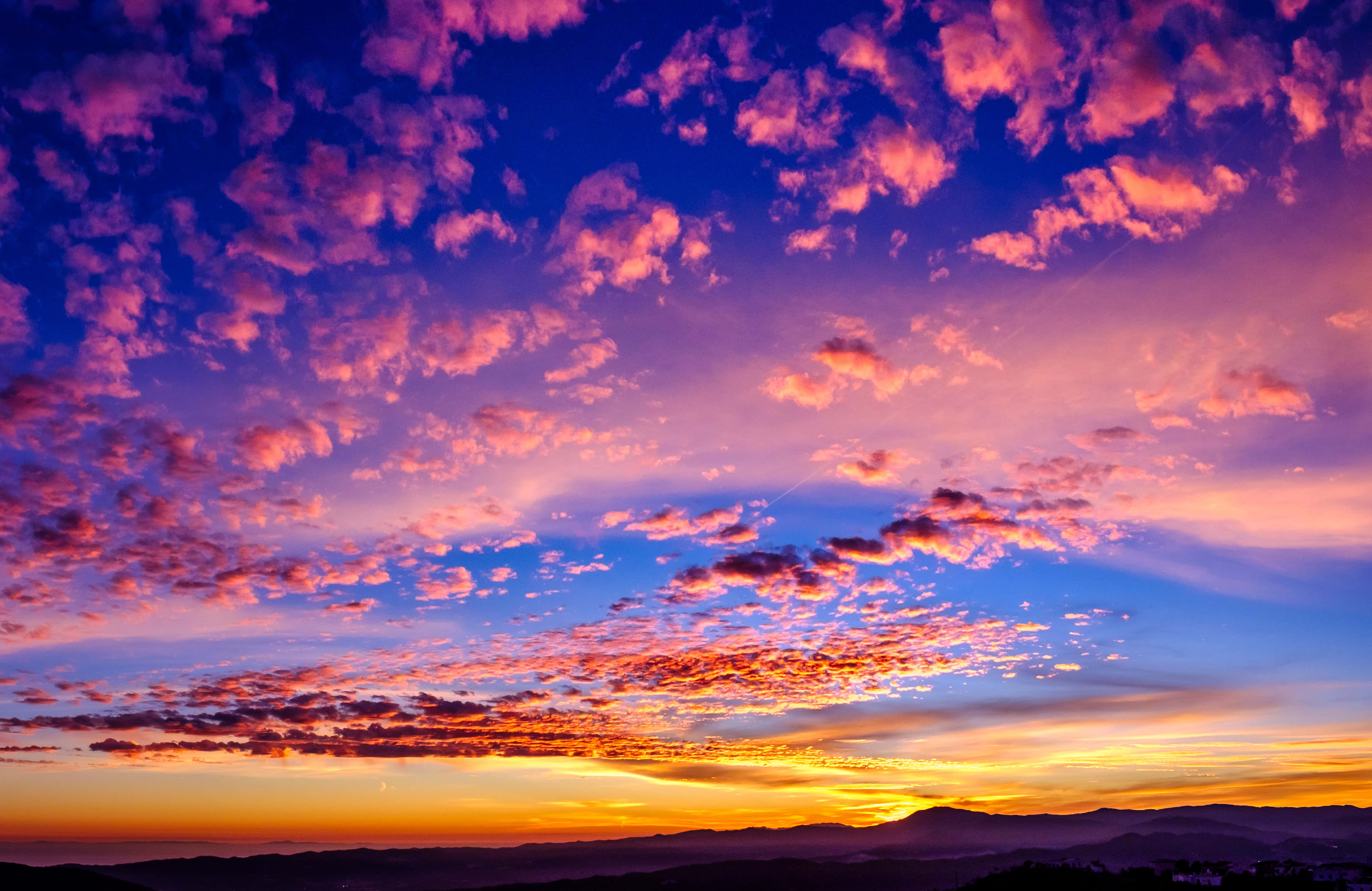 pink and blue sunset clouds, fiery oranges, deep purples, 4K Desktop Wallpaper
