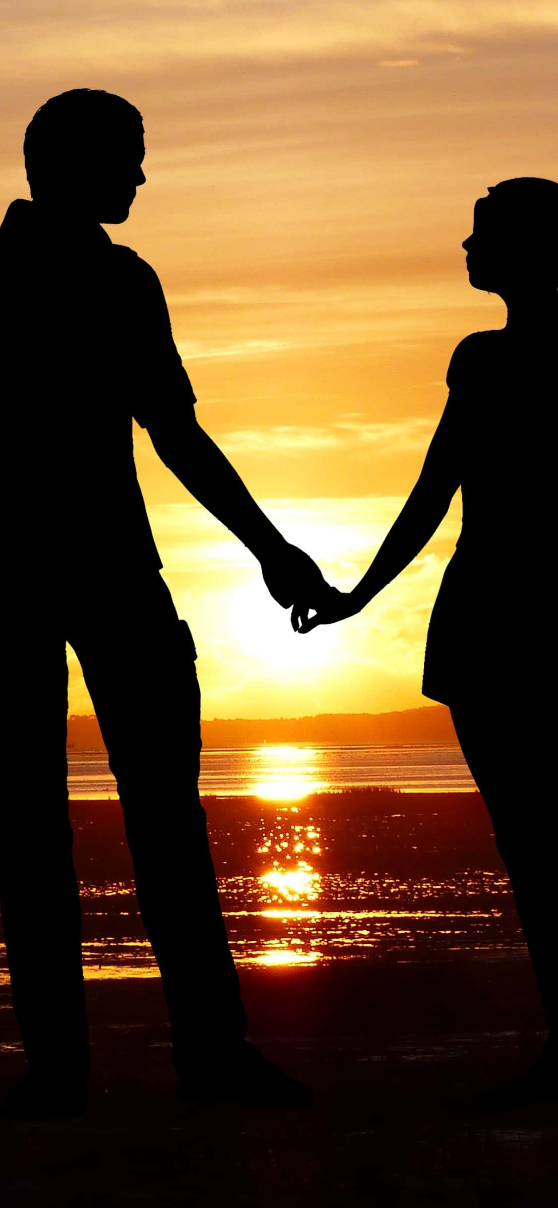 Sunset Couple, silhouetted couple, glowing sunset, Full HD Phone Wallpaper