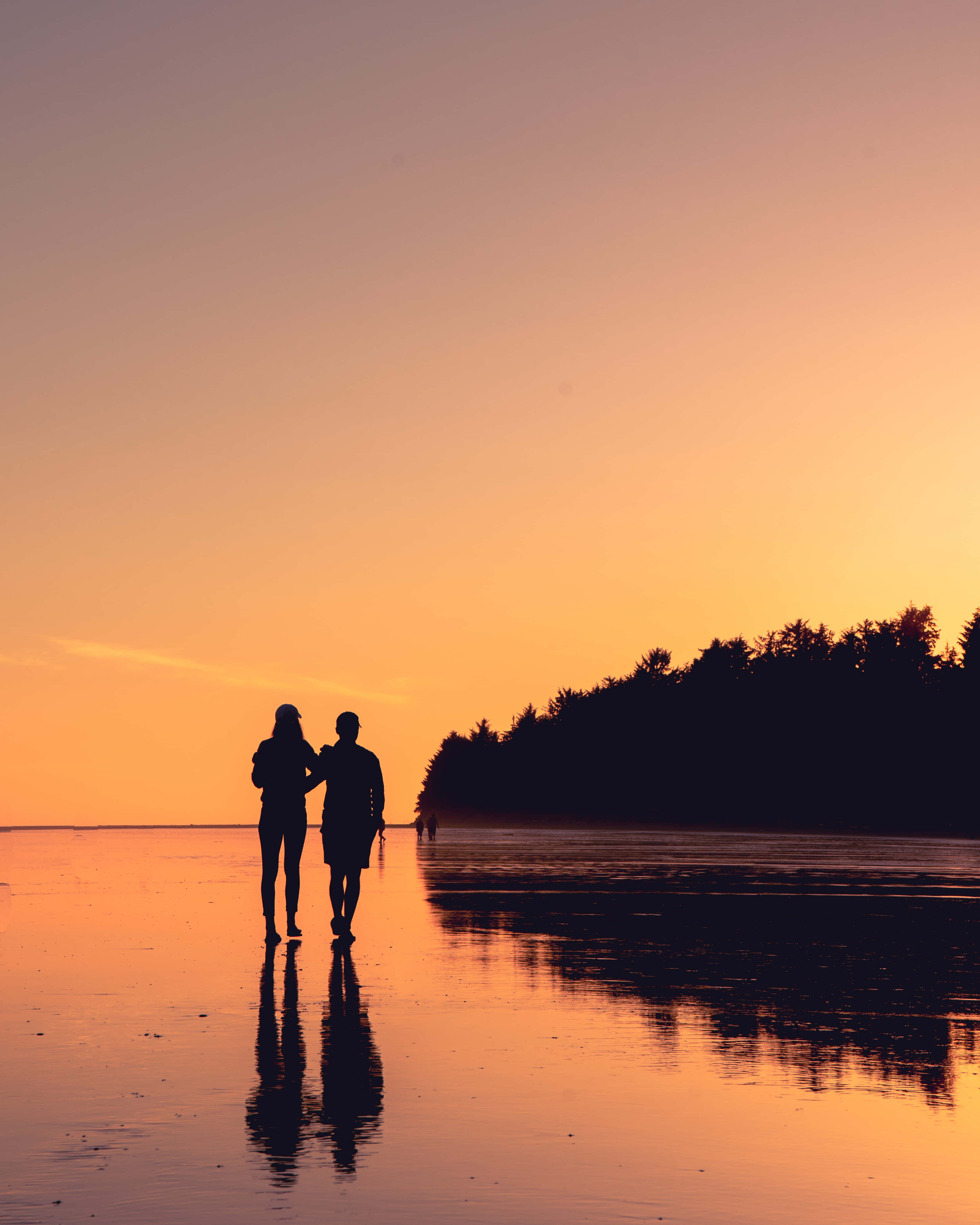Sunset Couple, orange sky, wet beach, 4K Phone Wallpaper