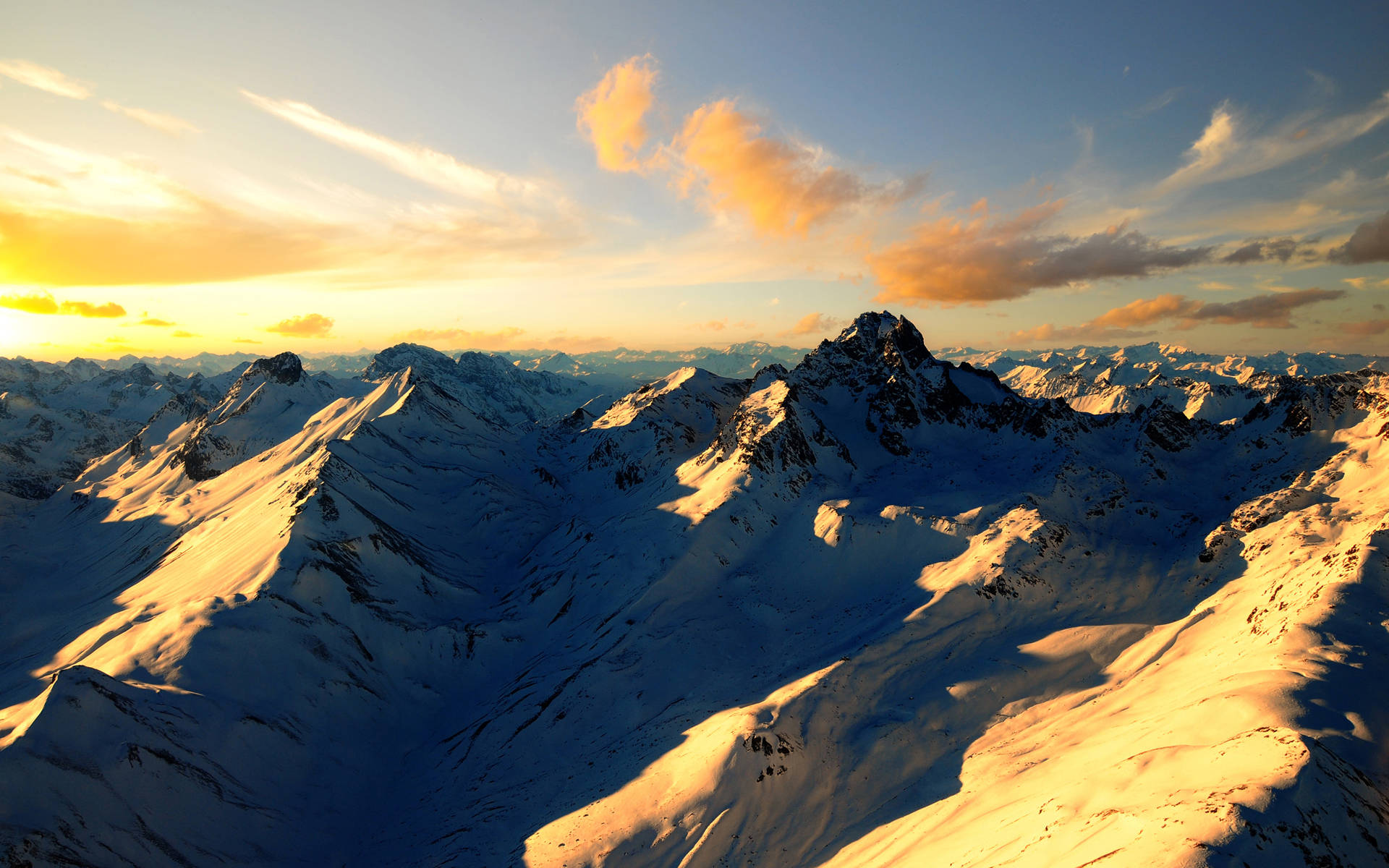 snowy mountain ranges, sunset, golden light, Full HD Desktop Wallpaper