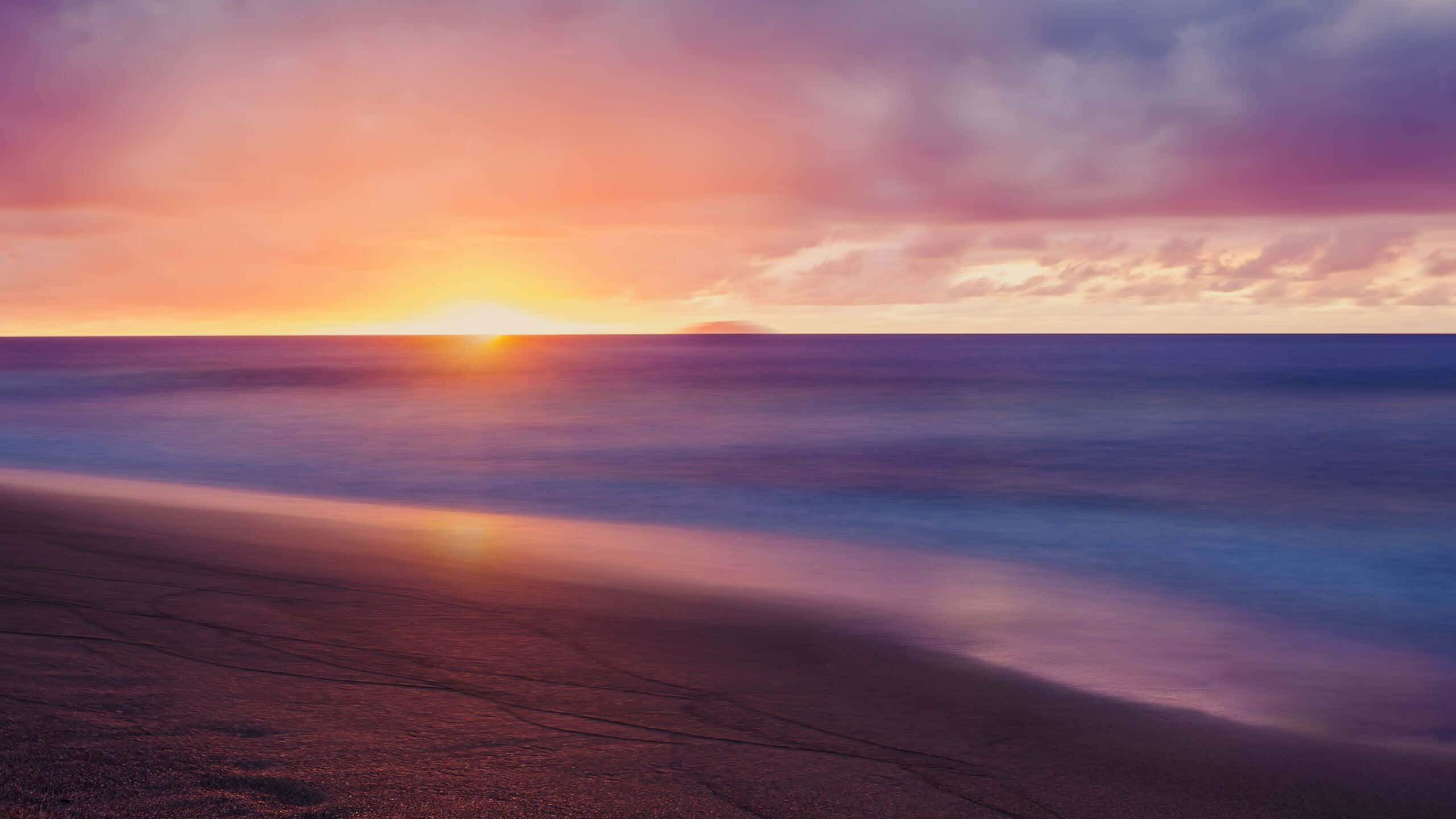 sunset, calm ocean, soft pink purple and orange hues, 2K Desktop Wallpaper