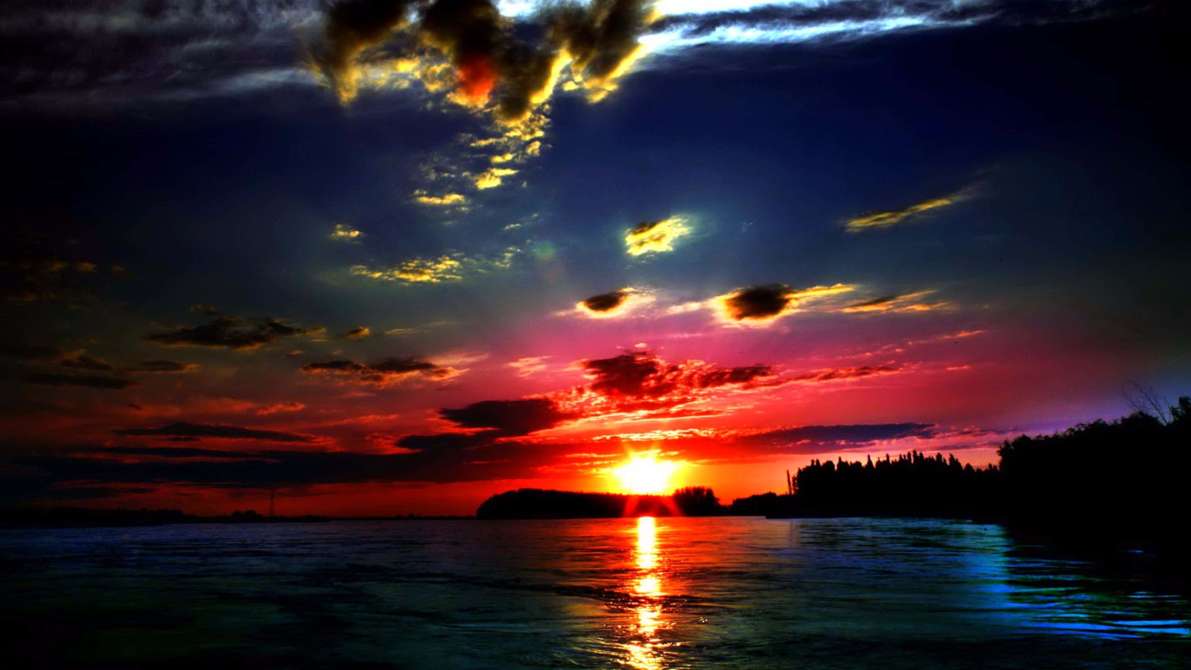 Sunset View, fiery sunset, red, purples, and golds, 4K Desktop Wallpaper