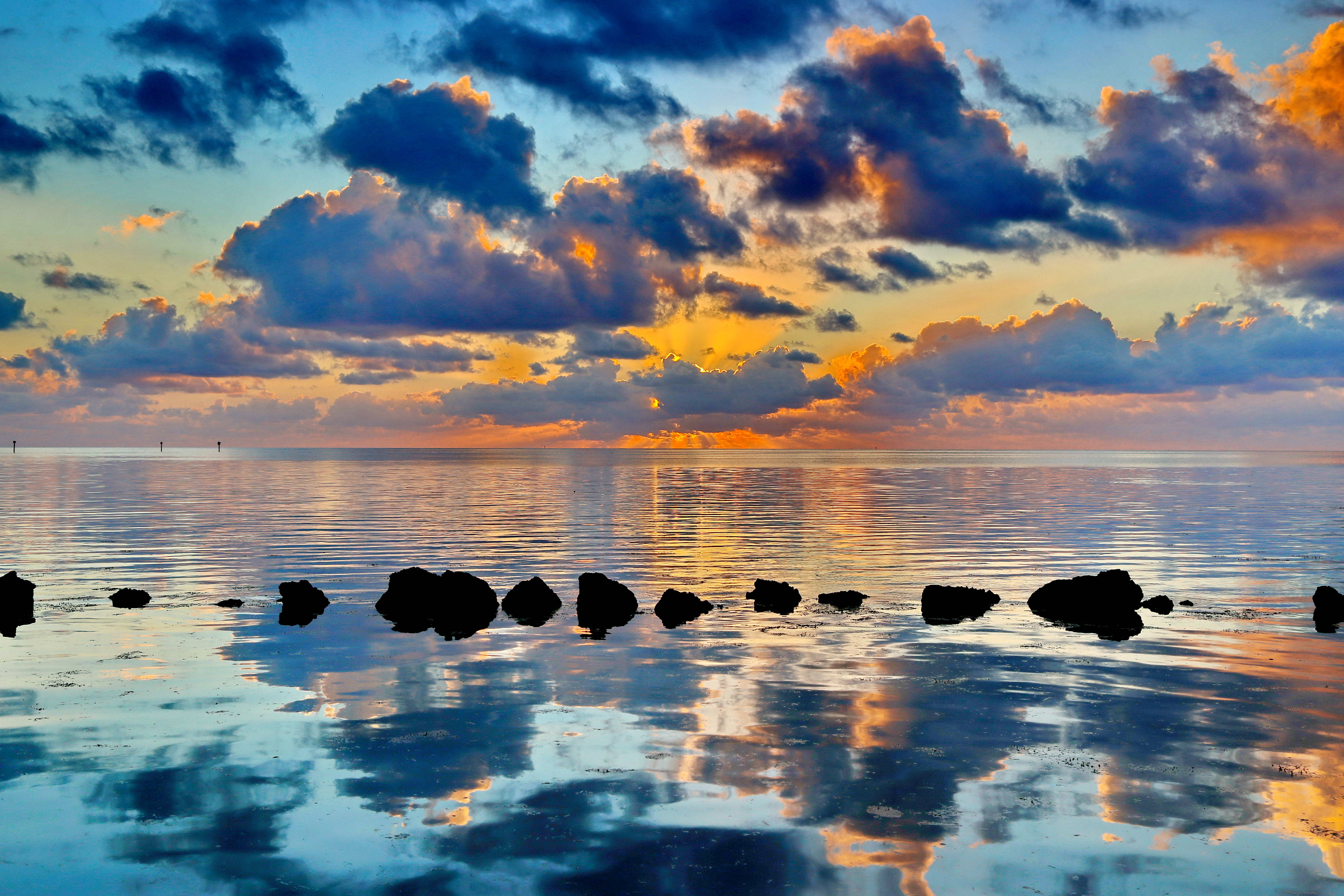 sunset, calm water, vibrant orange and blue clouds, 5K Desktop Wallpaper